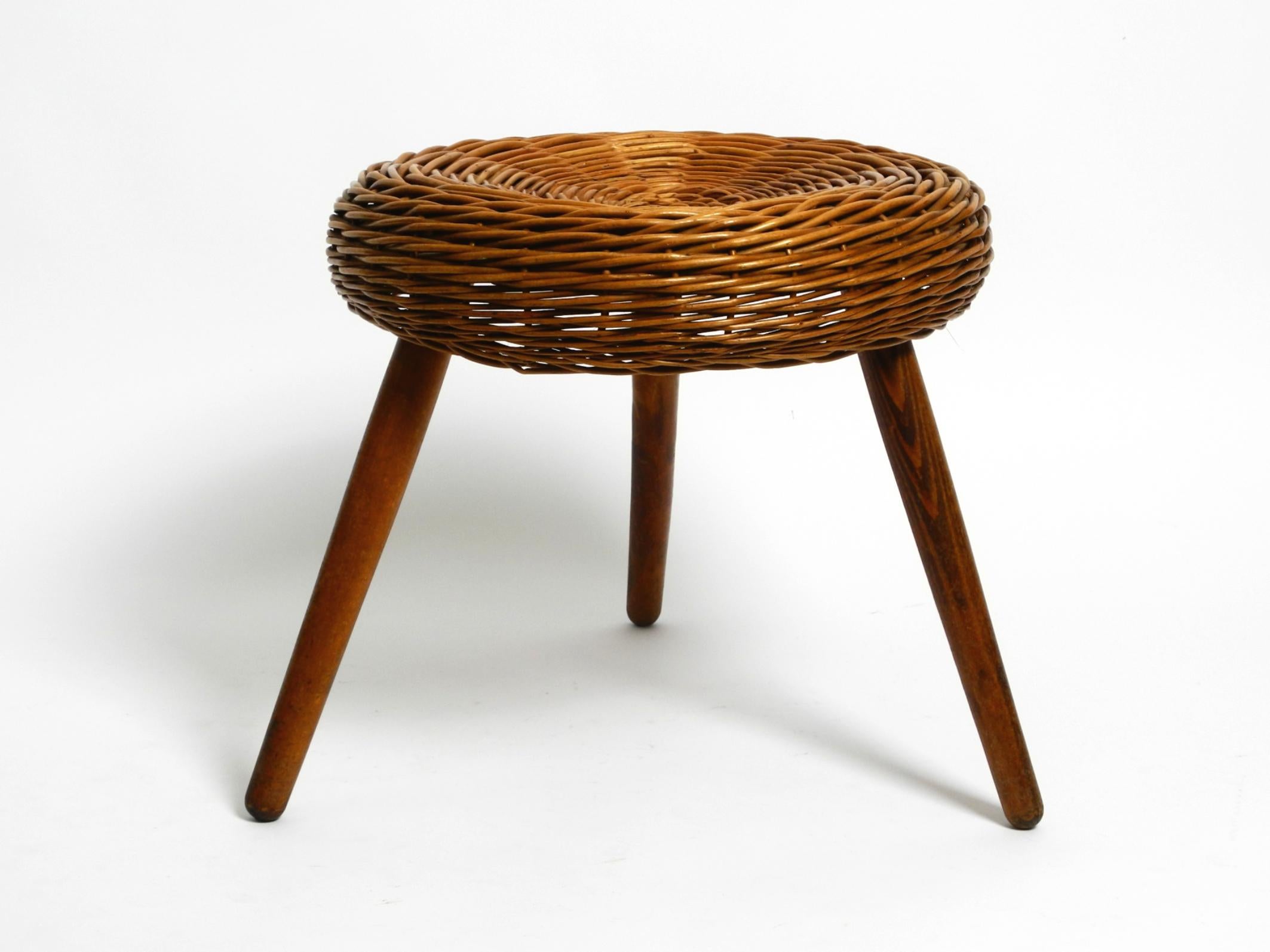 Mid-20th Century Original large Mid Century Modern rattan stool with wooden legs by Tony Paul For Sale