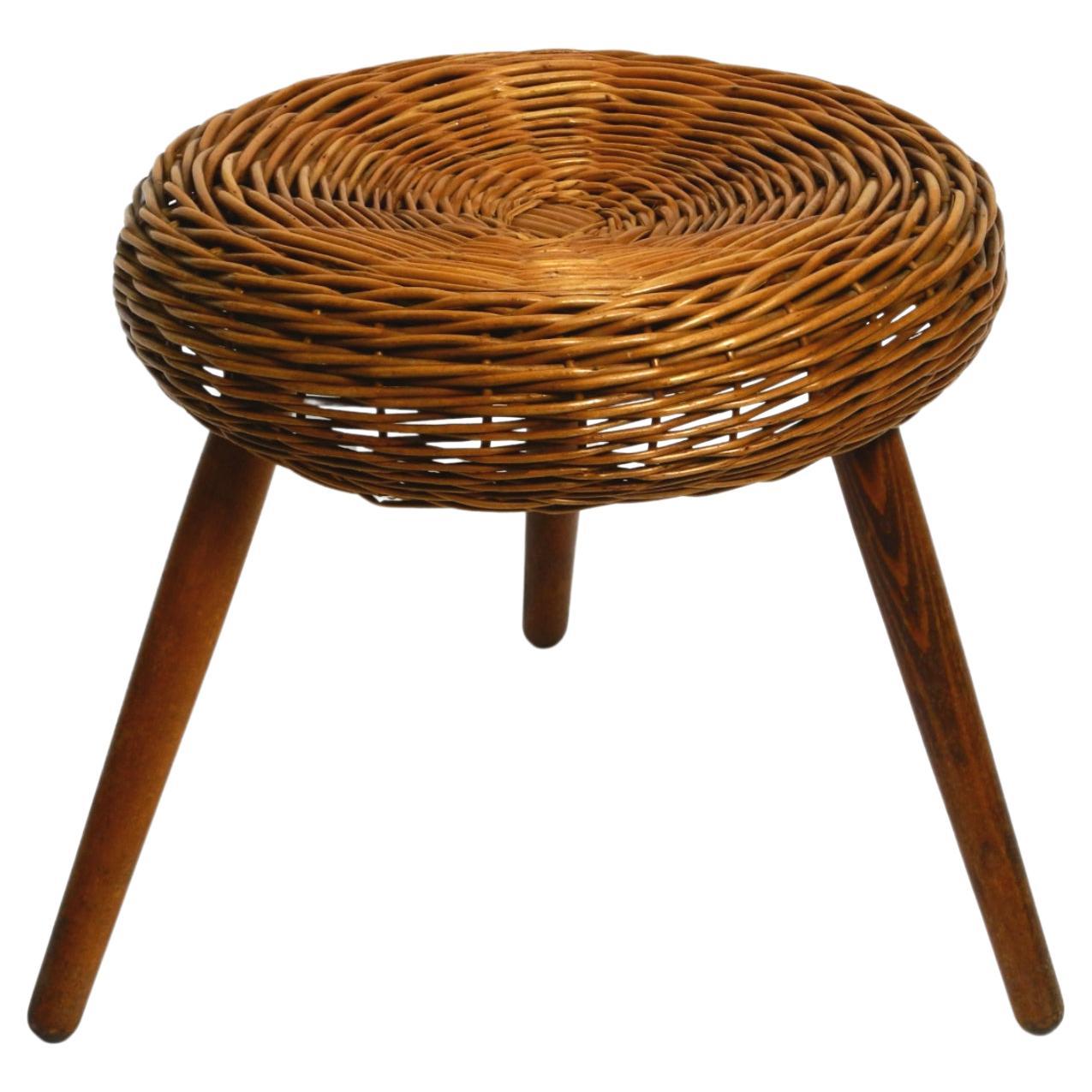 Original large Mid Century Modern rattan stool with wooden legs by Tony Paul For Sale