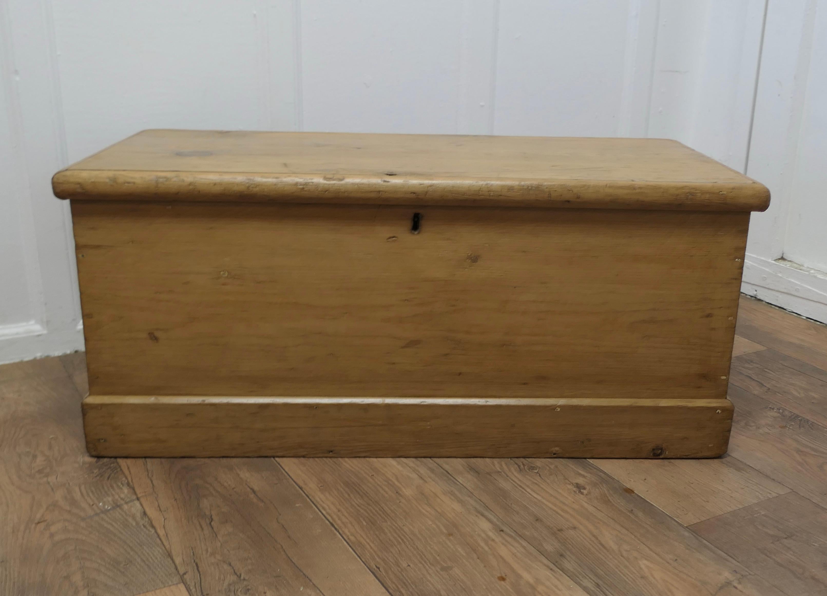 Original Large Victorian Stripped Pine Blanket Box, or Coffee Table

 This is an attractive solid pine box, it is made in good quality pine, it is sound with carrying handles and a candle box on the inside
So a Blanket Box, a Toy Chest the choice is