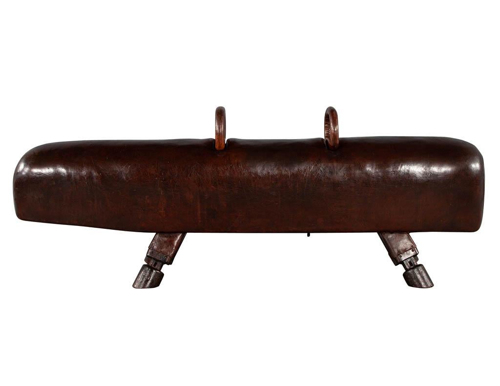 Original brown leather full length pommel horse in original patinated condition. England, circa 1930’s. All original in great condition considering its age and use. A perfect accessory to make a bold statement in any space. Price includes