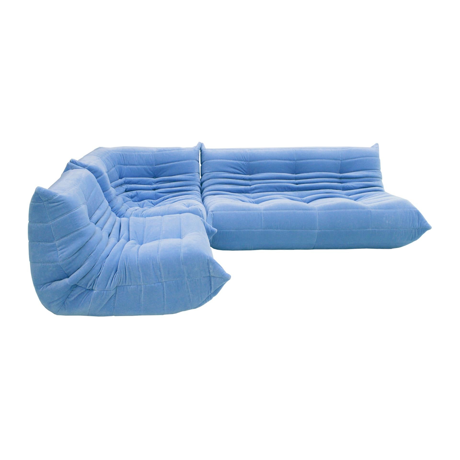Iconic sofa mod. Togo designed by Michel Ducaroy and manufactured by Ligne Roset in the 1970s. This sectional sofa is reupholstered in blue cotton velvet. These sofa is incredibly comfortable.
This iconic piece is recognisable by its carachteristic