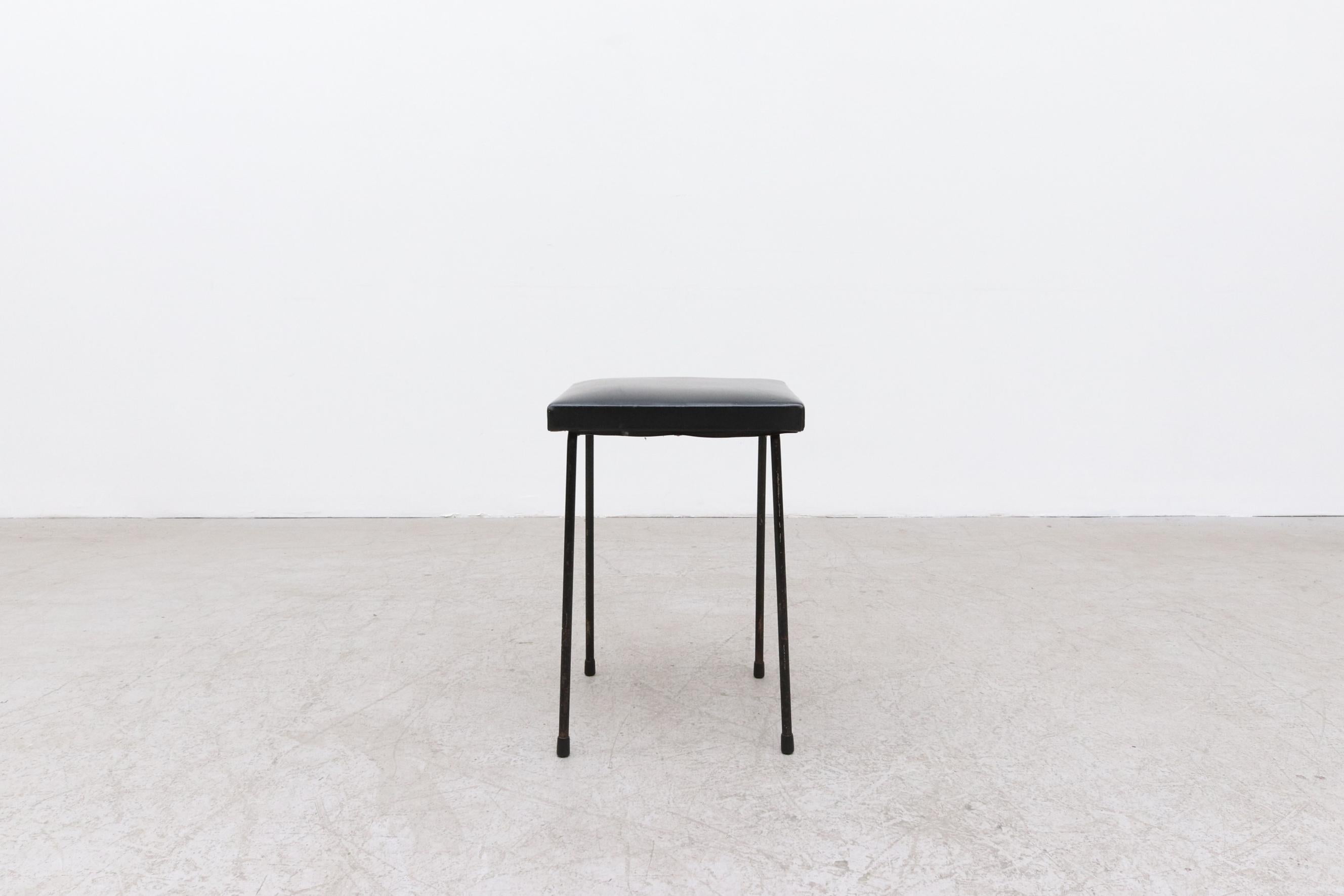 Little Kembo Stool with Original Black Skai Upholstery and Black Enameled Metal Frame. In very original condition with visible wear including chipping to frame and minor tears/scratches on the seat. Wear is consistent with its age and use.