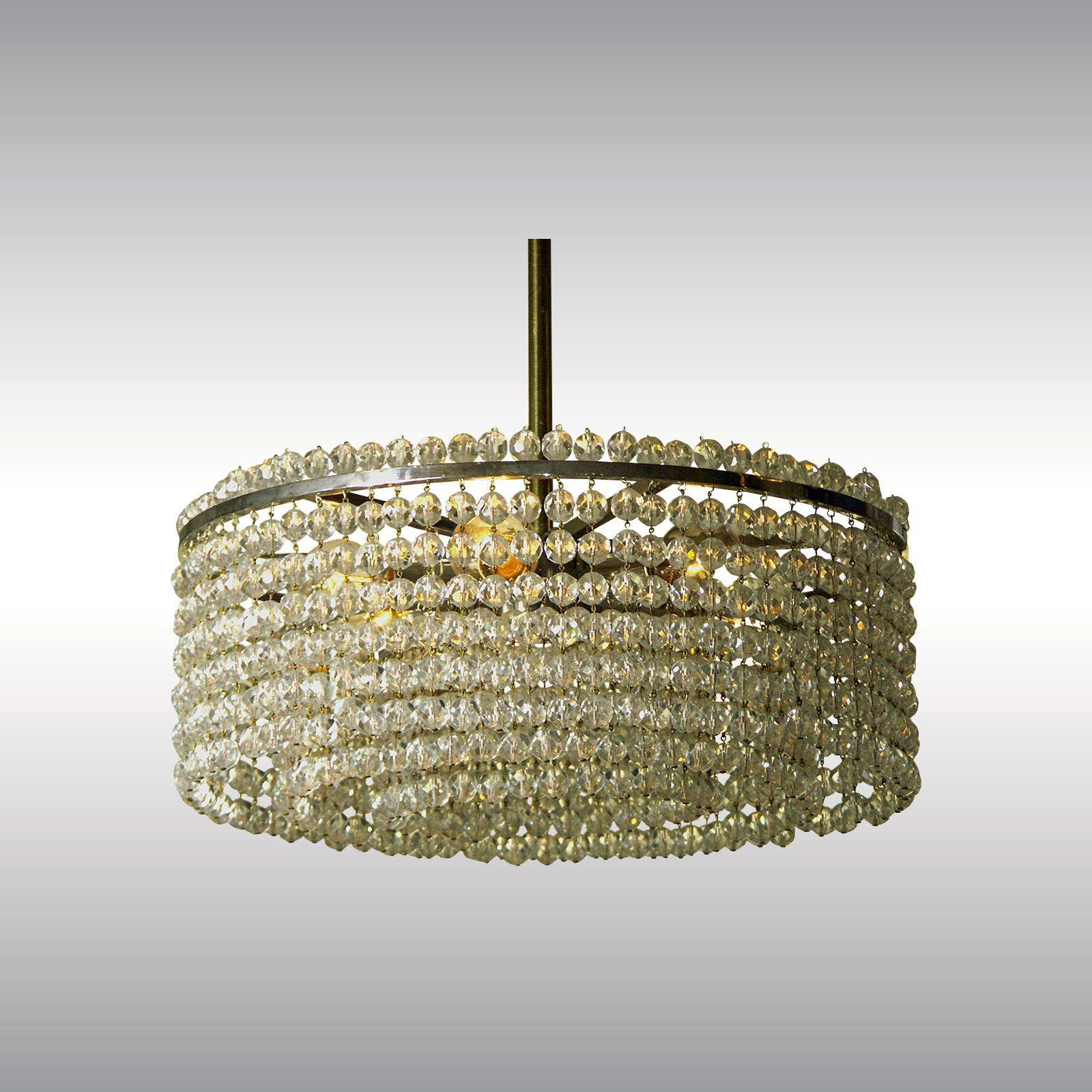 A very modern and stylish chandelier with hand-cut crystal balls in three layers and six bulbs, with the name 