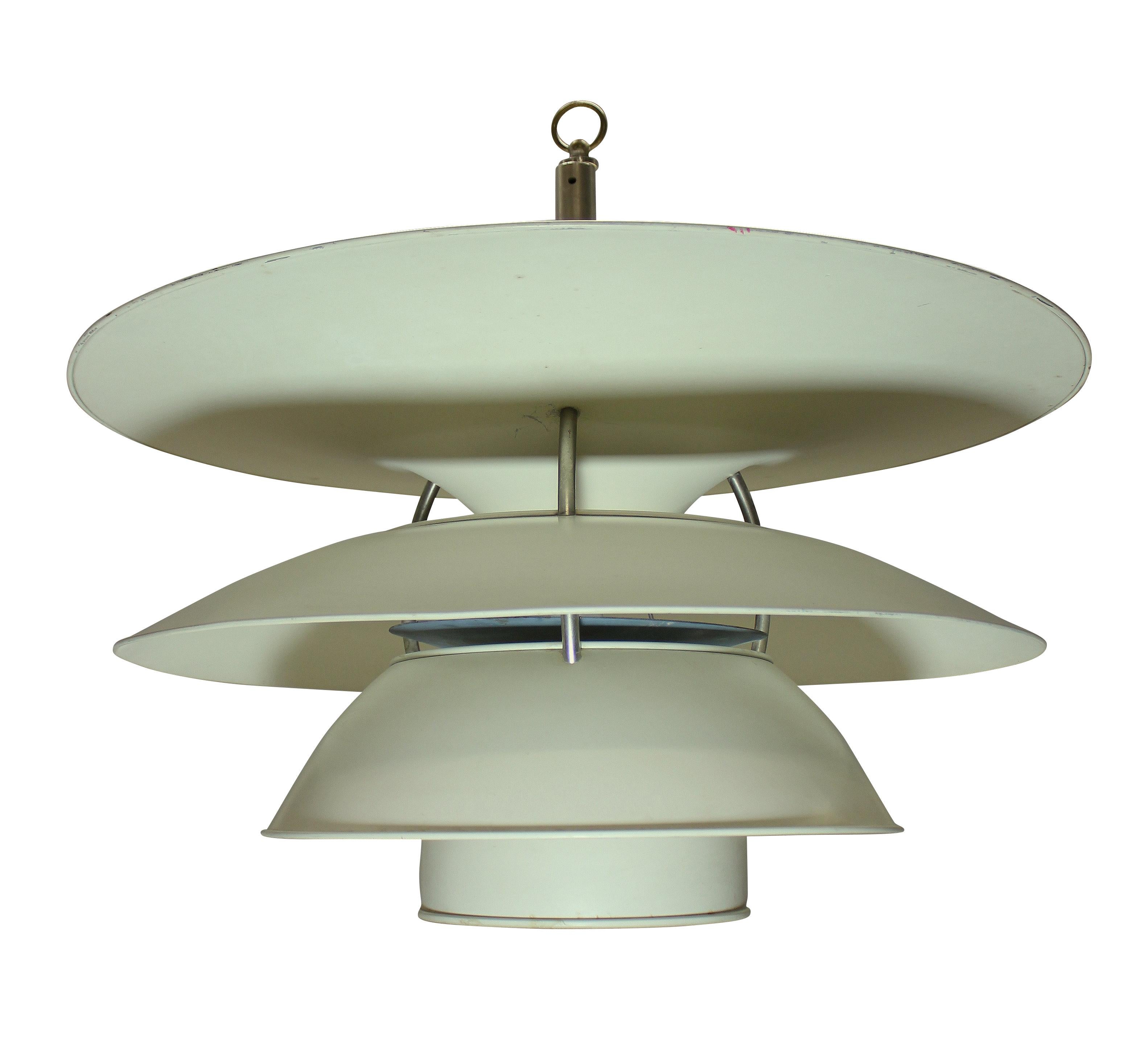 A Danish pendant light by Louis Poulsen. This is an original light, which has been much copied, with a good patina.