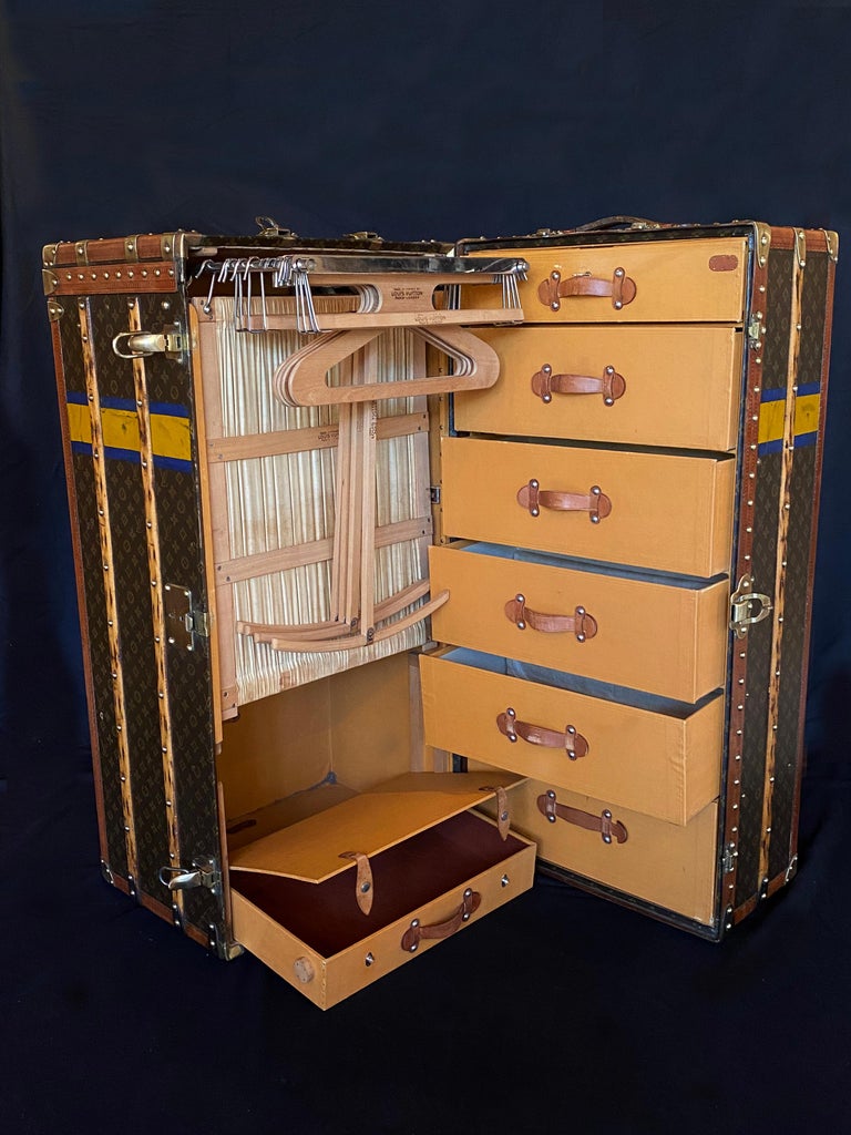 A truly luxurious and a fantastic example of a wardrobe trunk in amazing condition; covered in Lois Vitton from the first quarter of the 20th century, origionally designed for international passage on steamer boats. In 1870’s, the Wardrobe trunk