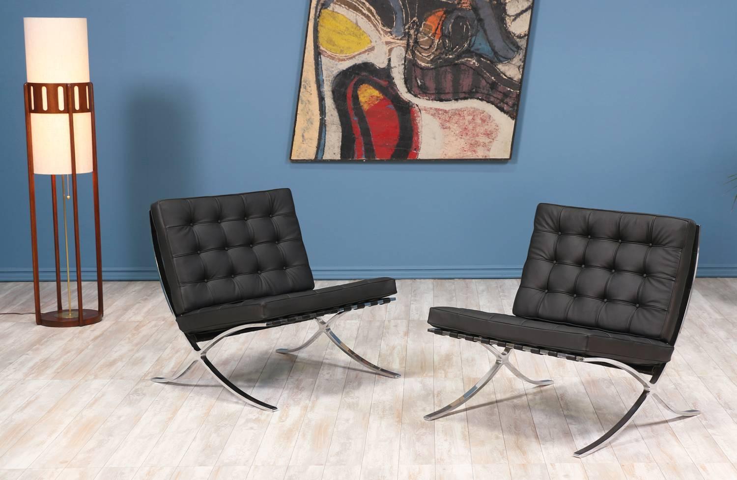 A pair of “Barcelona” chairs designed by Ludwig Mies van der Rohe for Florence Knoll Inc. in the United States circa 1960’s. Initially created for the German Pavilion at the Barcelona exposition, each chair features a stable and newly polished steel