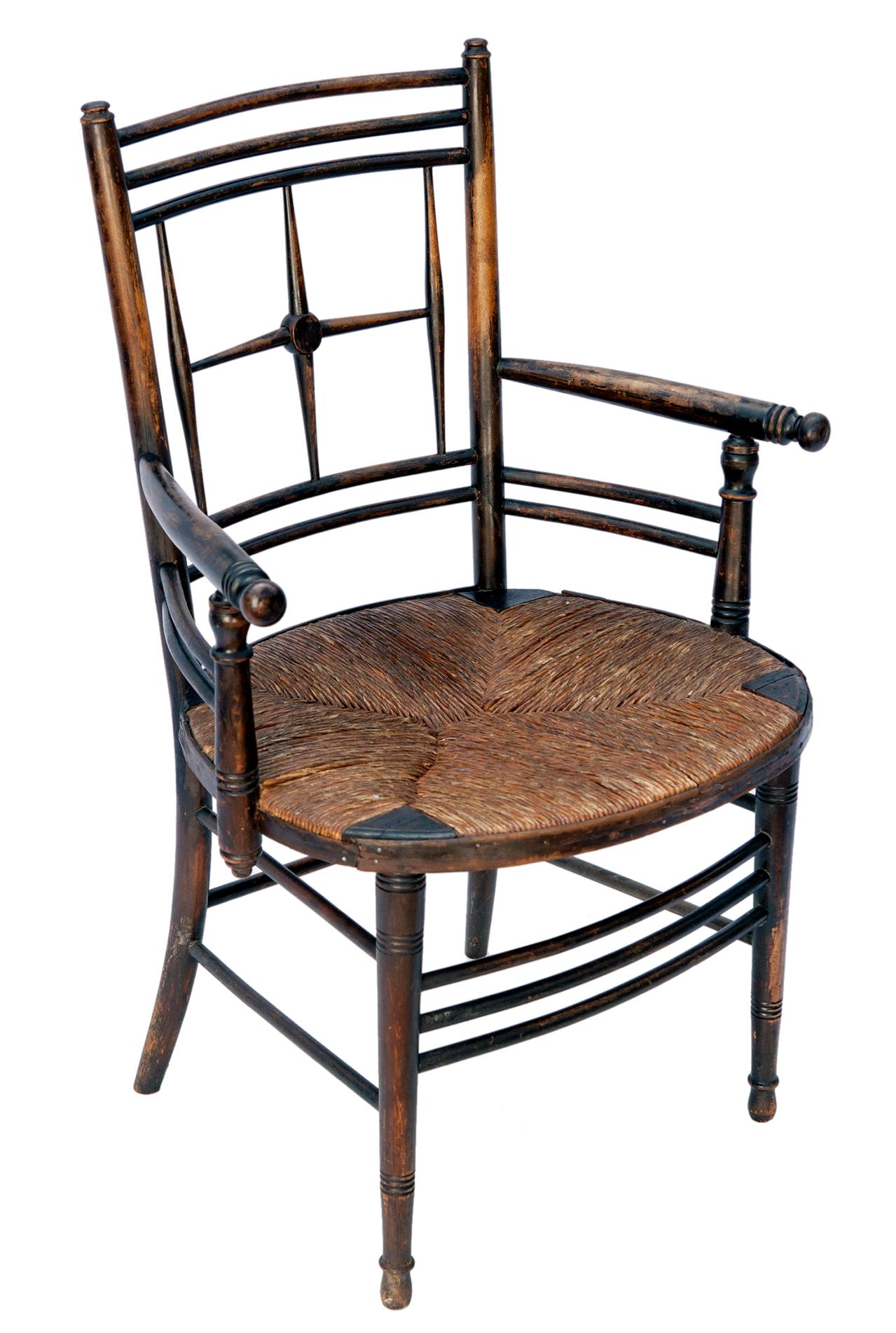 19th C aged ebony chair by William Morris & Company.
The Sussex Chair with rush seat was designed for William Morris by the British painter Ford Madox.
It has been restored during its life, attesting to its value.
This chair has been exhibited in