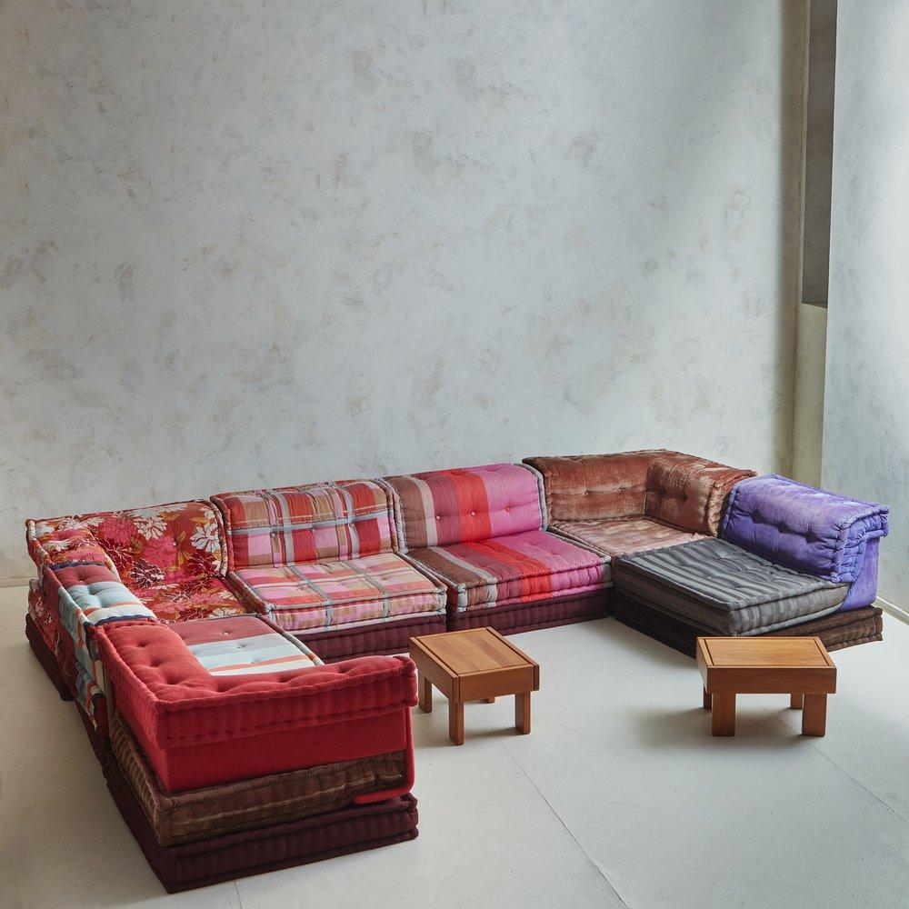 The Mah Jong sectional sofa is a timeless icon of furniture design crafted by Hans Hopfer for Roche Bobois in 1971. With its innovative modular design and endless compositional possibilities, this sofa embodies boundless freedom in both function and