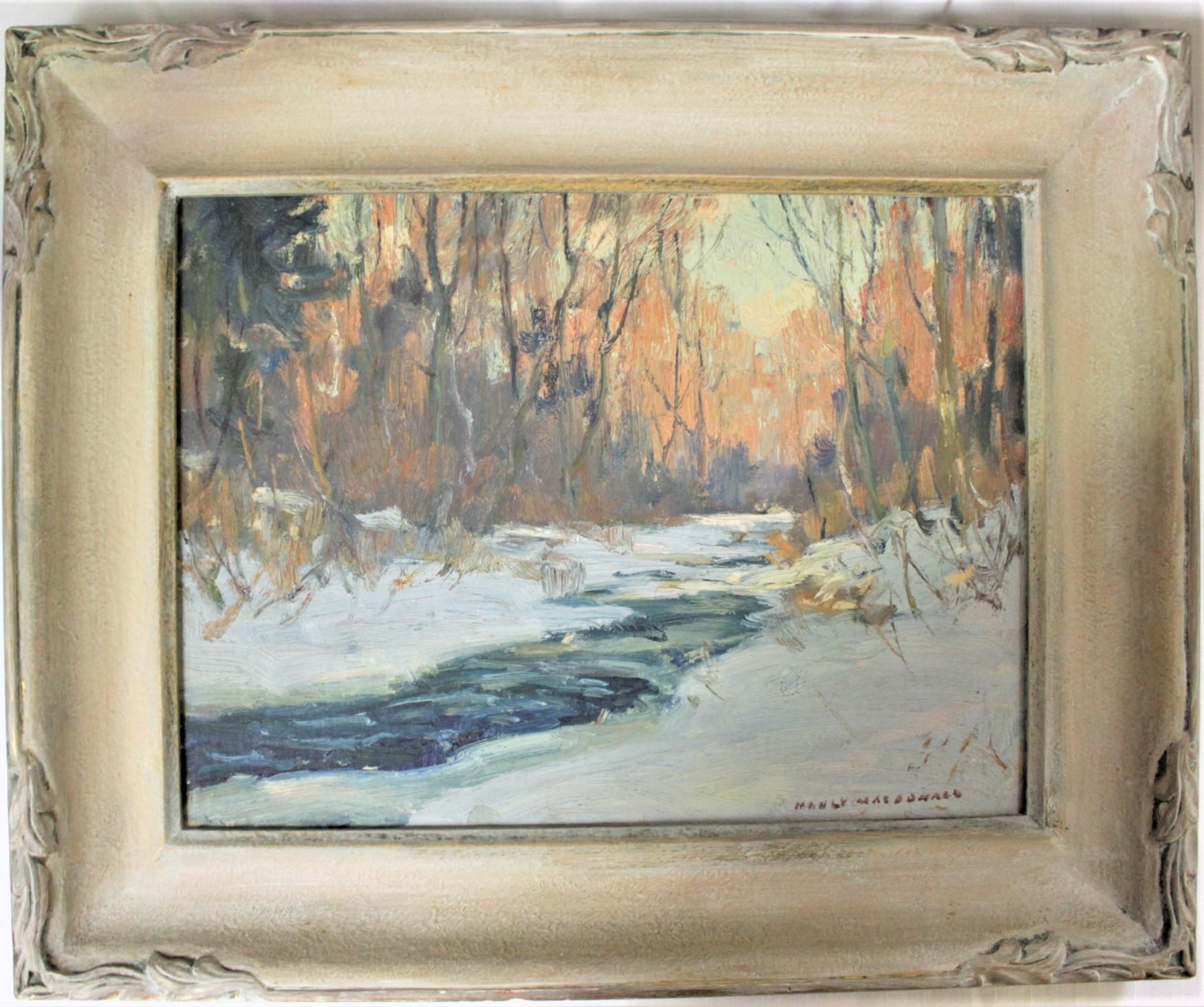 This original painting was done by the Canadian artist, Manly E. MacDonald in circa 1960 in his semi-impressionistic style. The painting is done on canvas artist's board and is a Canadian winter landscape scene of trees and a stream. The painting is