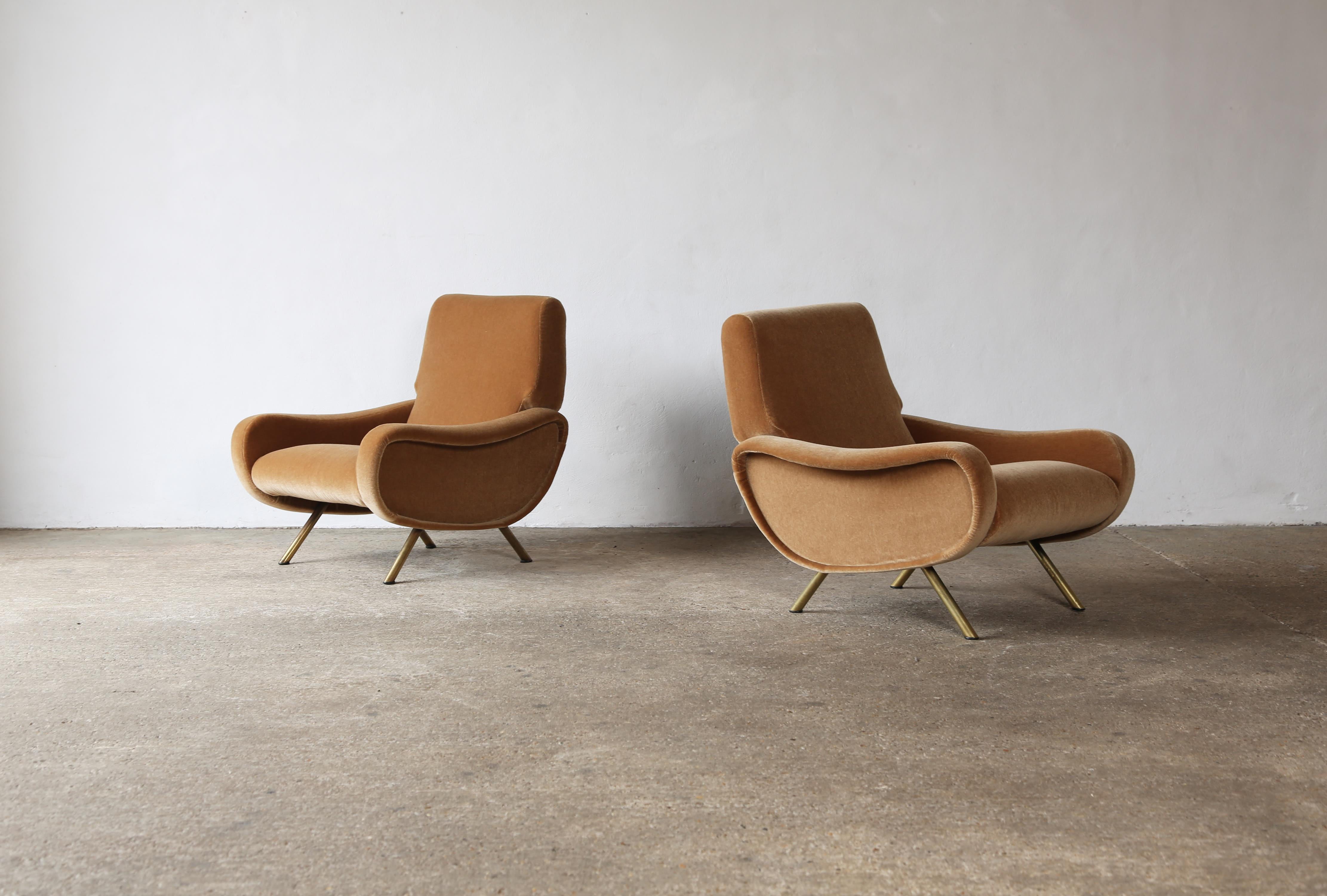 A pair of original, authentic Marco Zanuso lady chairs, Arflex, Italy, 1960s. Newly reupholstered in a luxurious, premium, burnt orange / rust coloured 100% mohair fabric.  Fast shipping worldwide.


