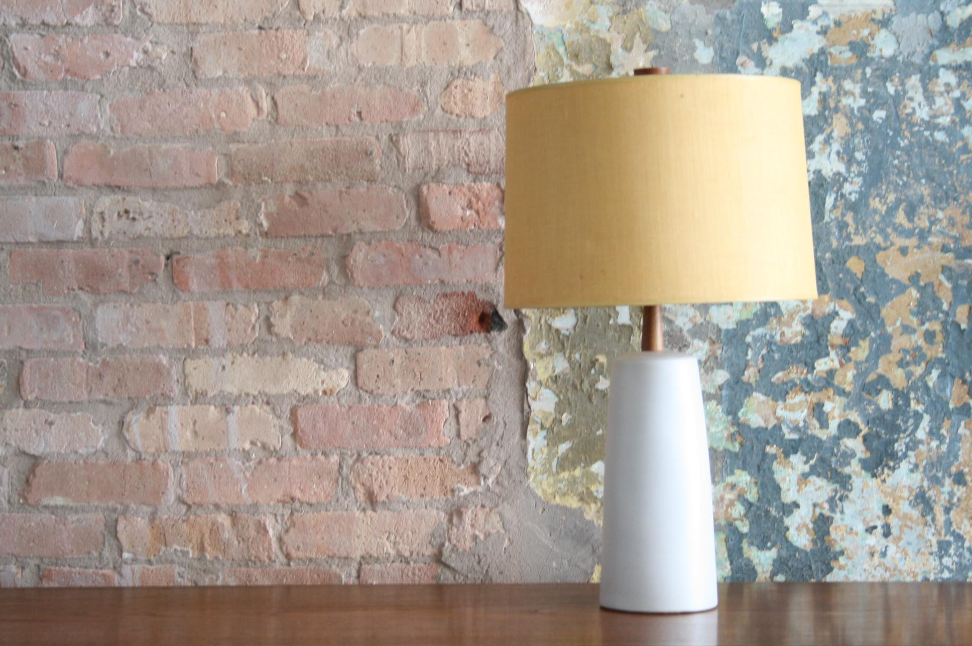 These rich and vivid glazed ceramic pottery table lamps were designed by Jane & Gordon Martz for Marshall Studios. Each is topped with original handmade Beige burlap shades and feature an original walnut finial with a base in a white beautiful matte