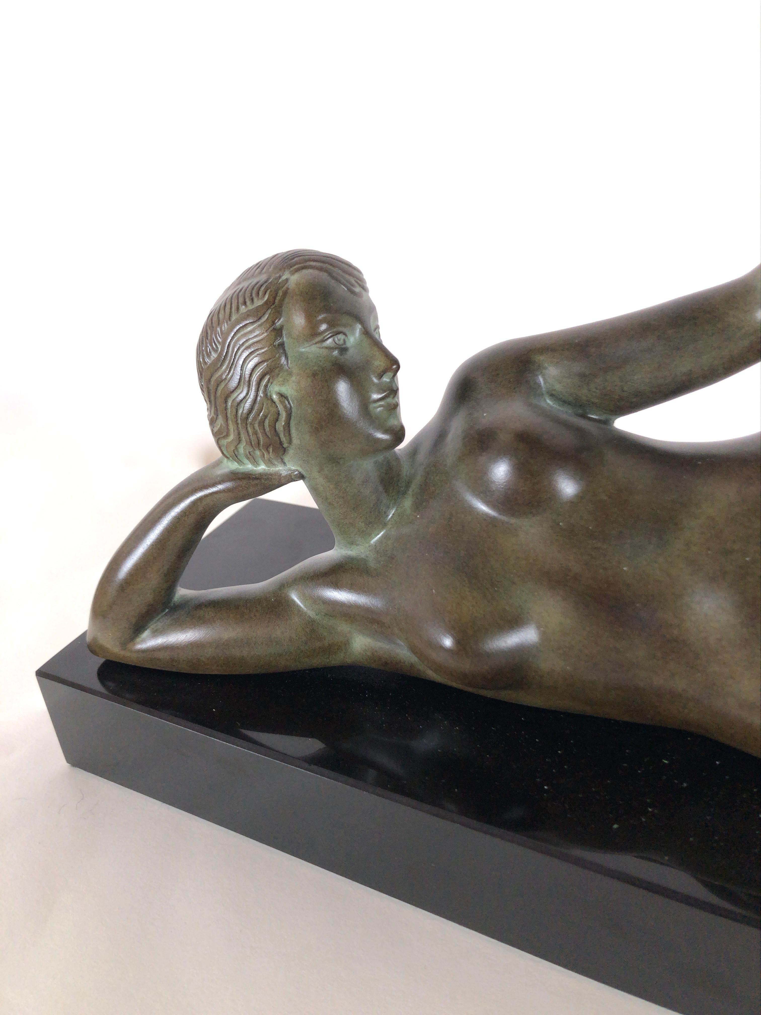 Patinated Original Max Le Verrier Lighted Sculpture Aube in Art Deco Style