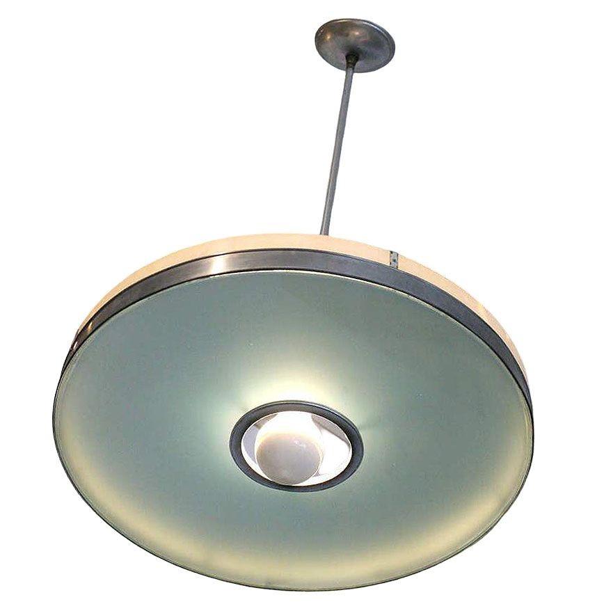 Streamlined Aluminum Ceiling Lamp from the Historic May Company Wilshire. This sleek, mid-century aluminum ceiling fixture features its original frosted glass shade, topped with a polished aluminum neck that adds a touch of industrial refinement.