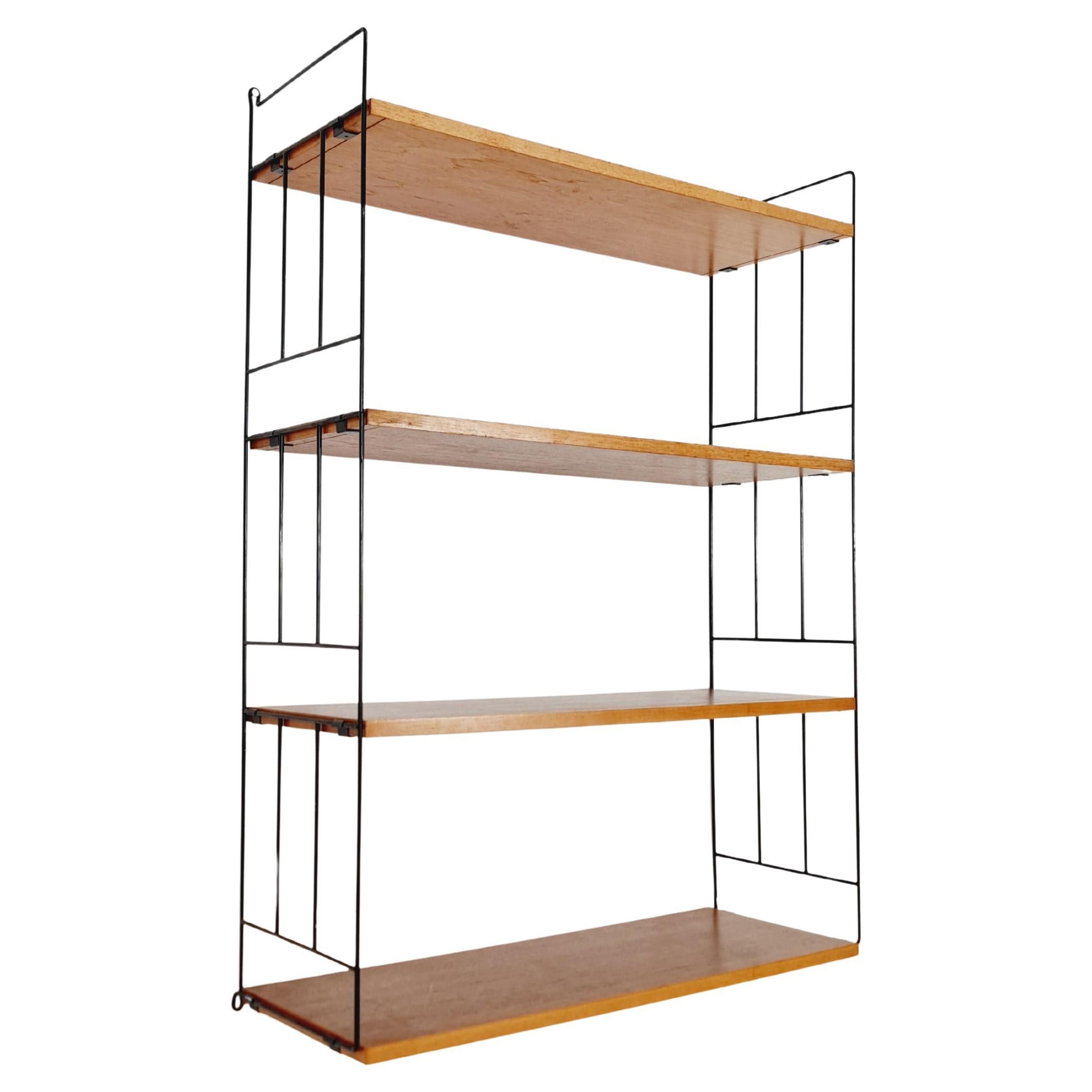 Sistema original de estanterías MCM Ash - compuesto por escaleras metálicas lacadas en negro en venta