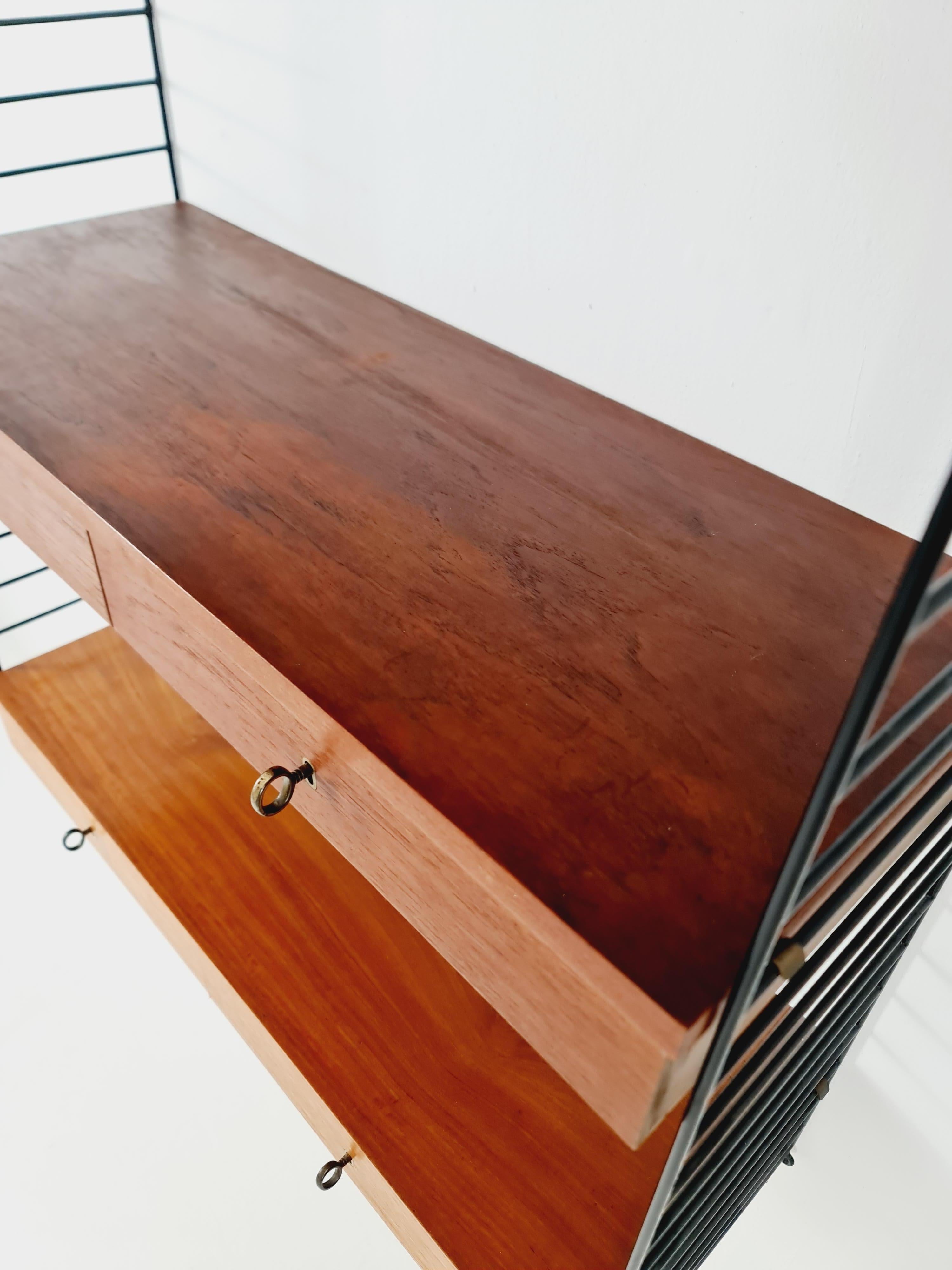 Mid-20th Century Original MCM Teak shelving system - consists of black lacquered metal ladders