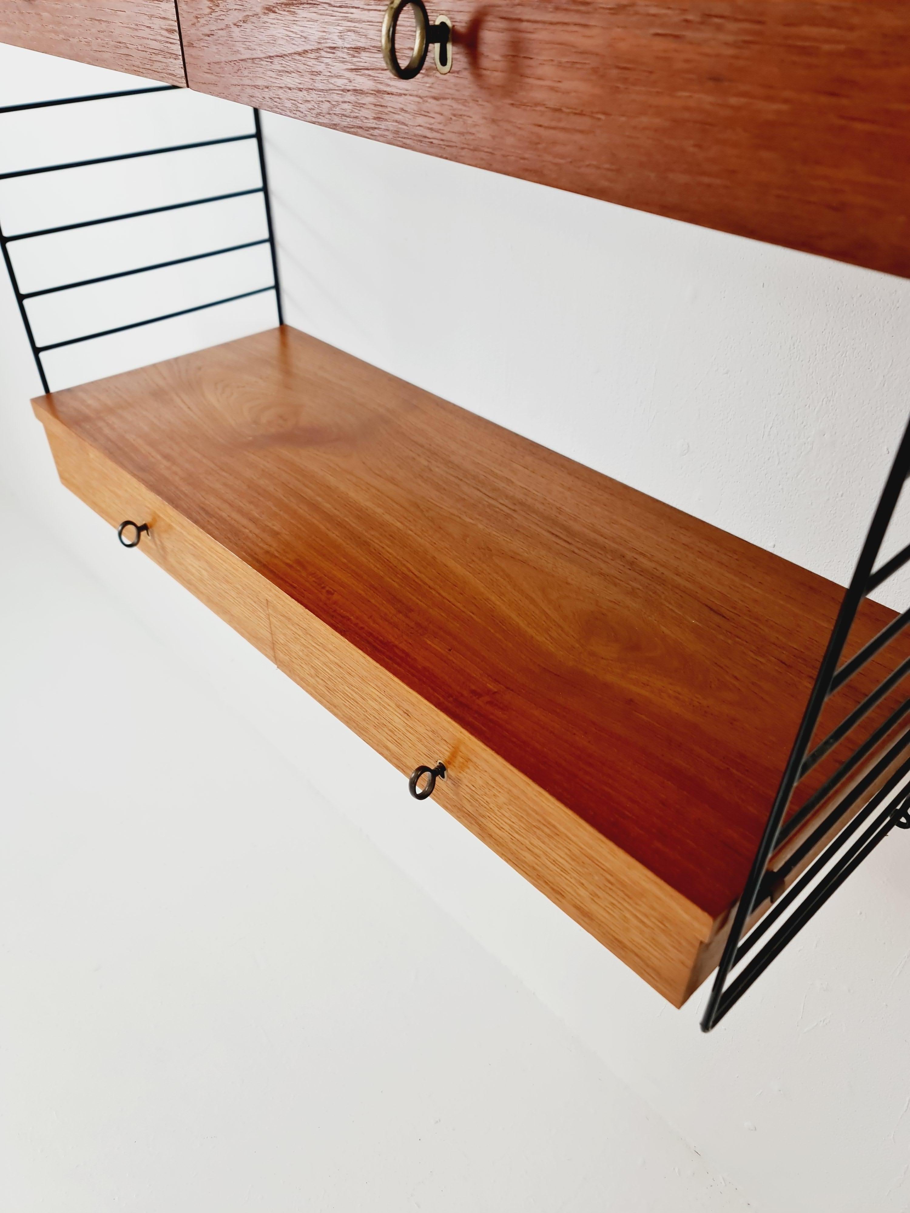 Metal Original MCM Teak shelving system - consists of black lacquered metal ladders