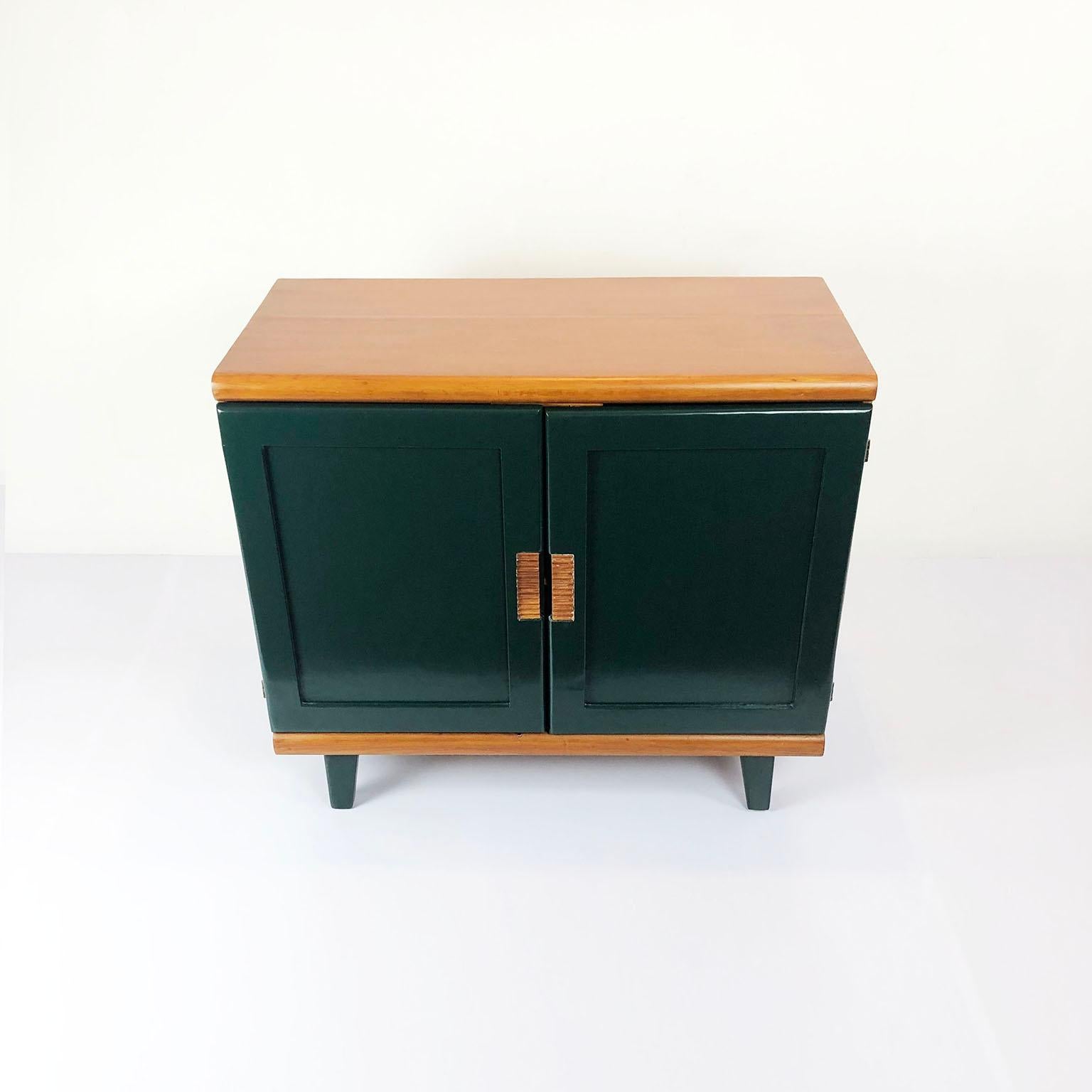 Designed by the American Bauhaus designer, Michael van Beuren in Mexico, this handmade, solid pine wood credenza was recently restored circa 1940.

About Michael van Beuren: Michael van Beuren (1911–2004) was born in New York and studied