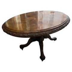 Original mid-19th century italian oval coffee table in walnut and walnut root