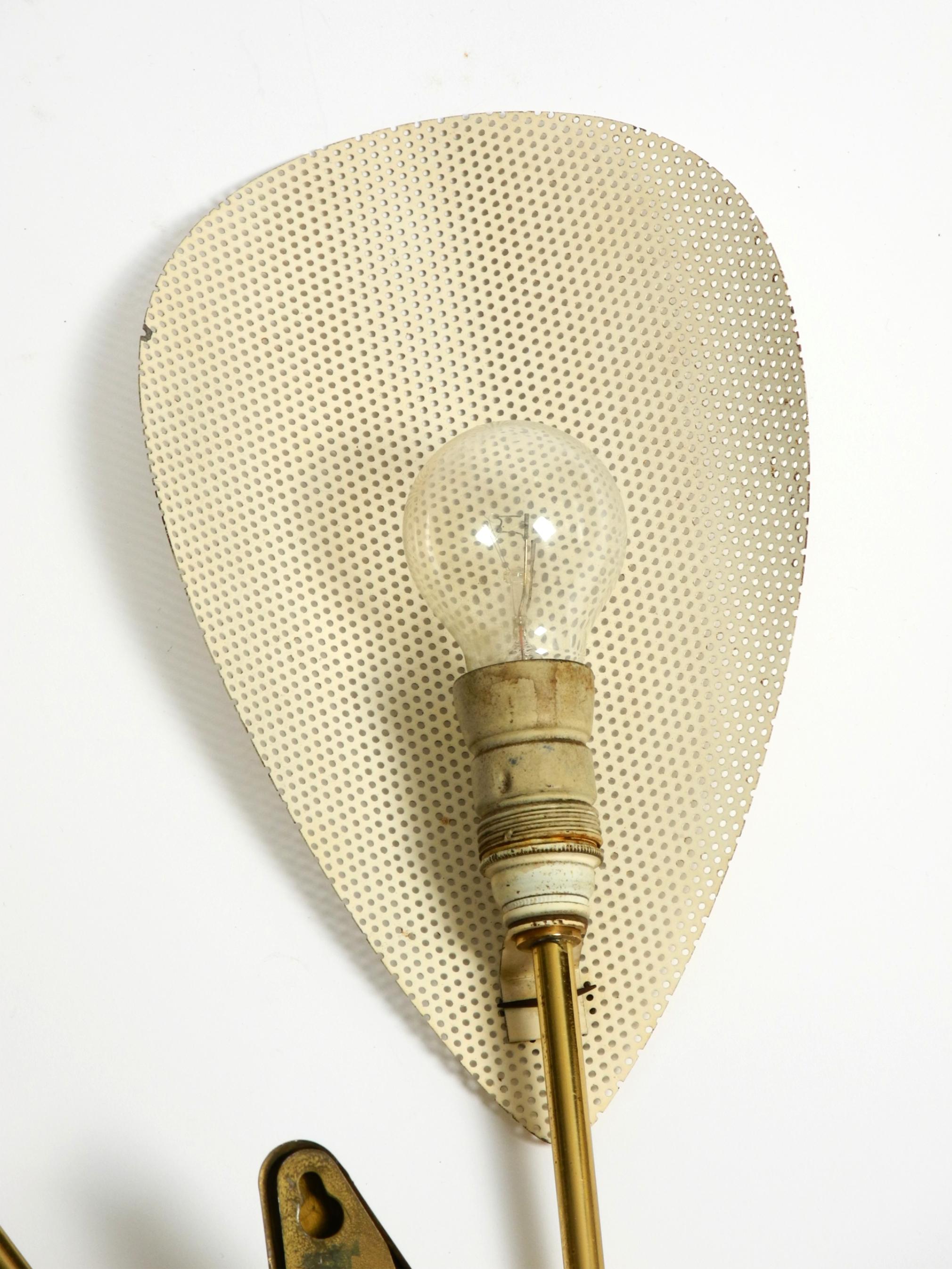 Original Mid Century brass wall lamp with perforated metal sheet lampshades For Sale 4