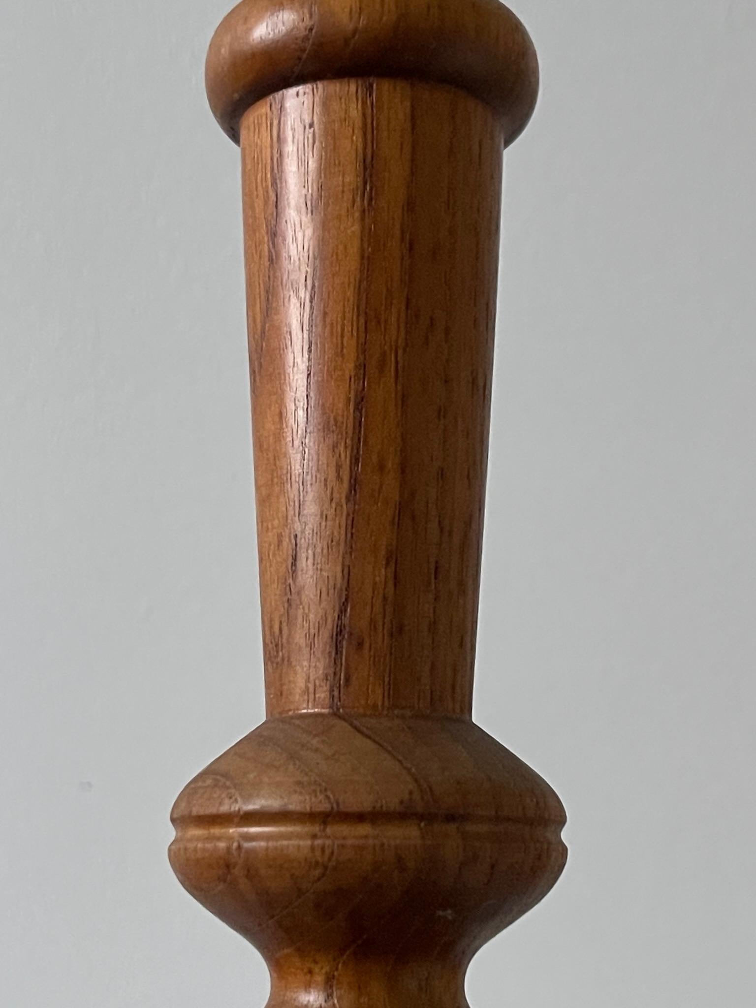 Mid-20th Century Danish modern table lamp in one solid piece of carved teak wood. Denmark 1950s For Sale