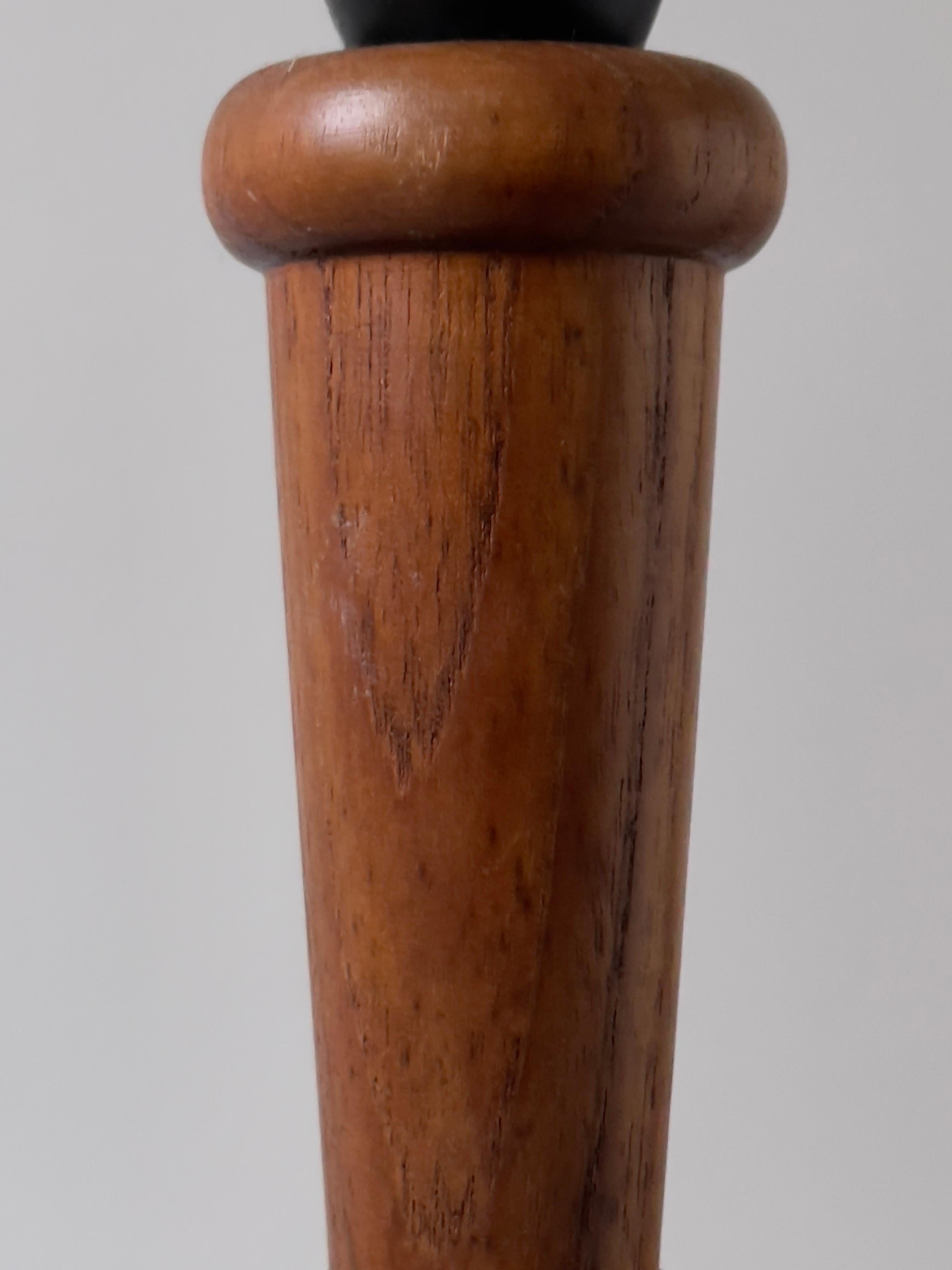 Teak Danish modern table lamp in one solid piece of carved teak wood. Denmark 1950s For Sale