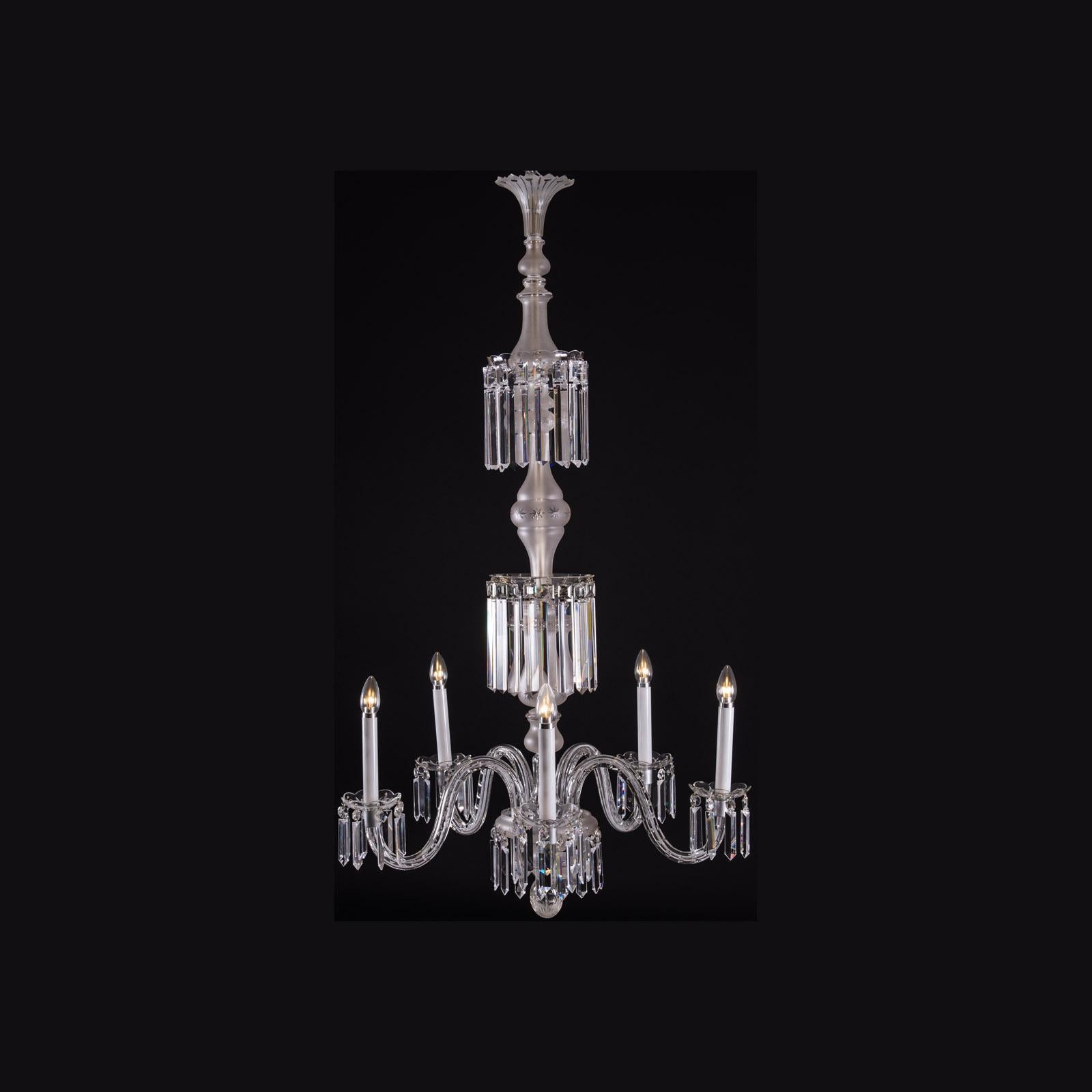 A wonderful, Mid-Century Modern -slim and elegant glass-chandelier with five arms plus one wall lamp.