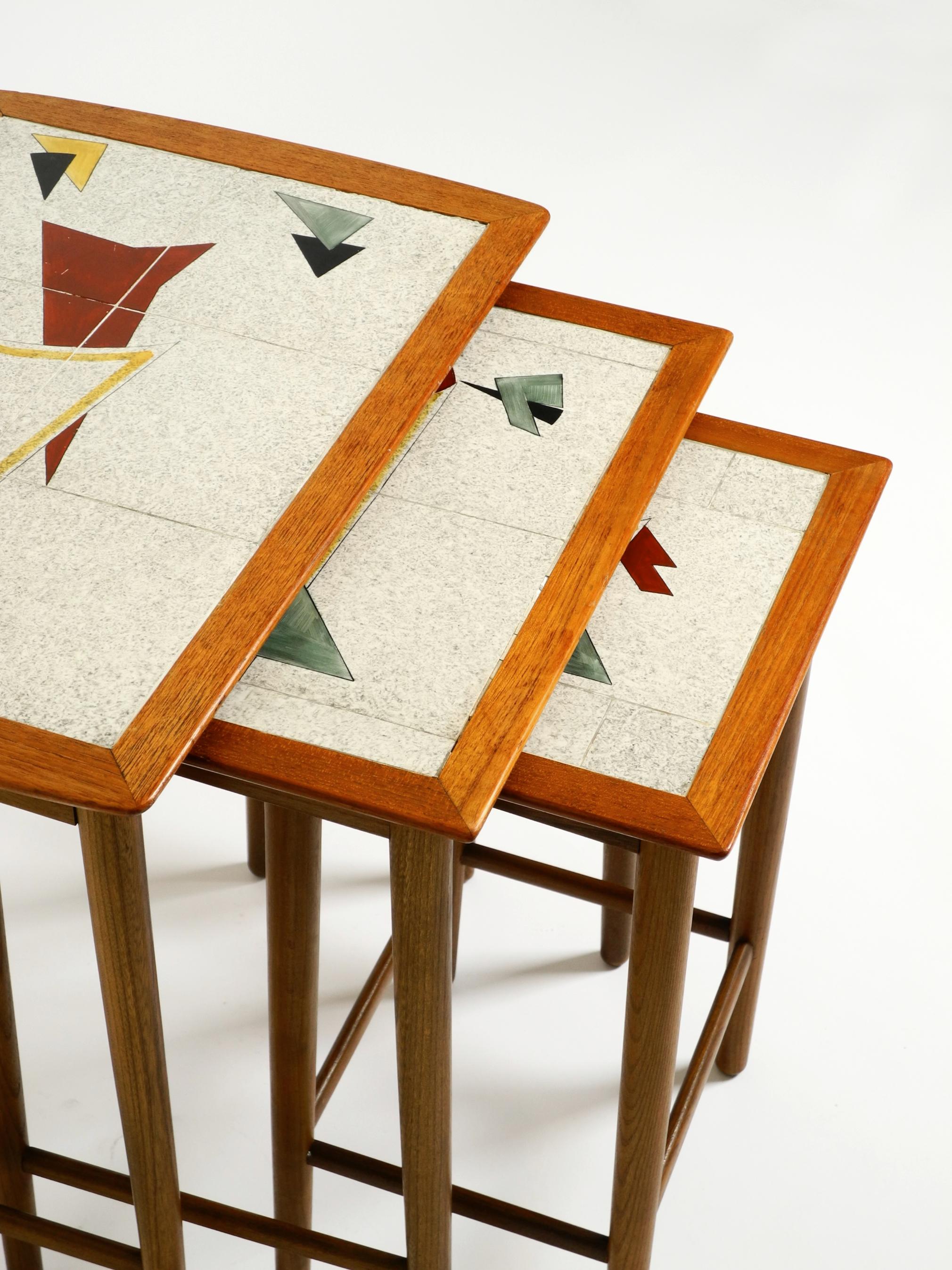Original Mid Century set of 3 teak nesting tables with colorful Formica surfaces 9
