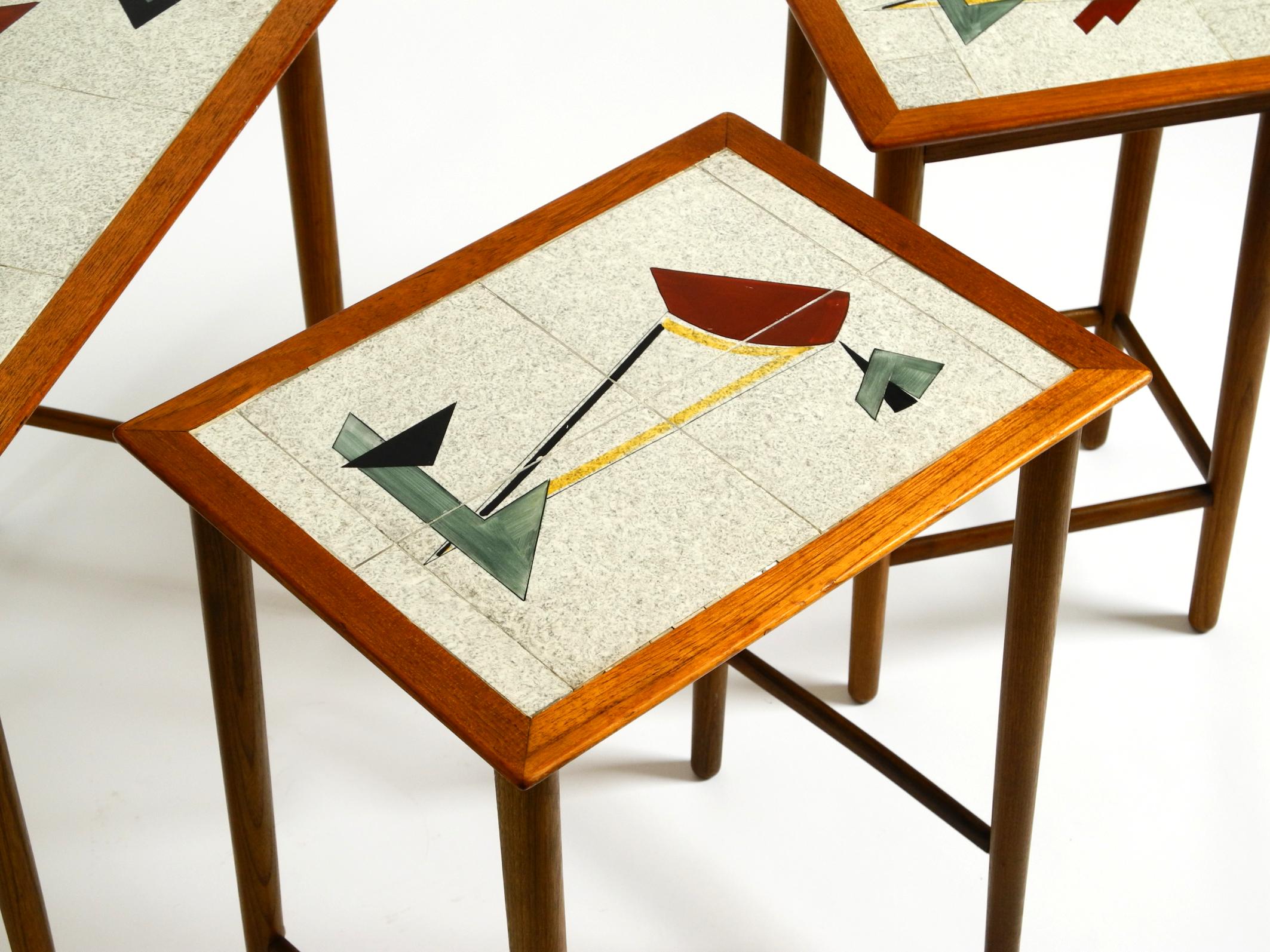 Original Mid Century set of 3 teak nesting tables with colorful Formica surfaces 11