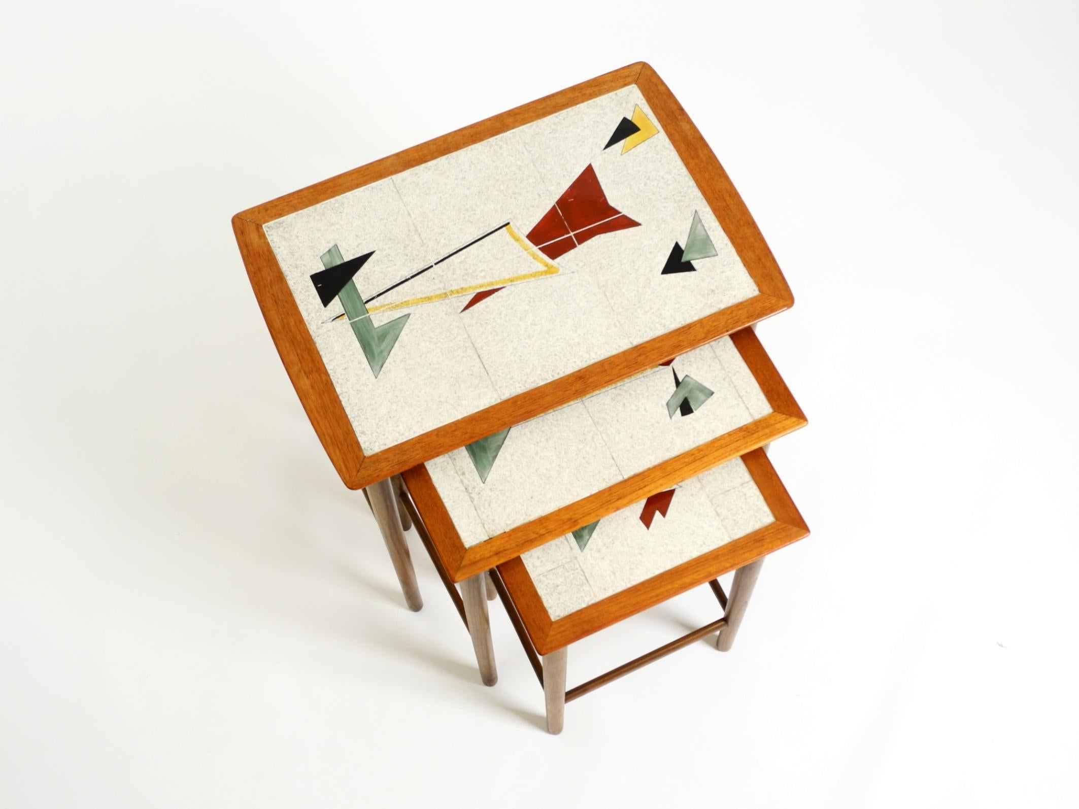 Mid-Century Modern Original Mid Century set of 3 teak nesting tables with colorful Formica surfaces