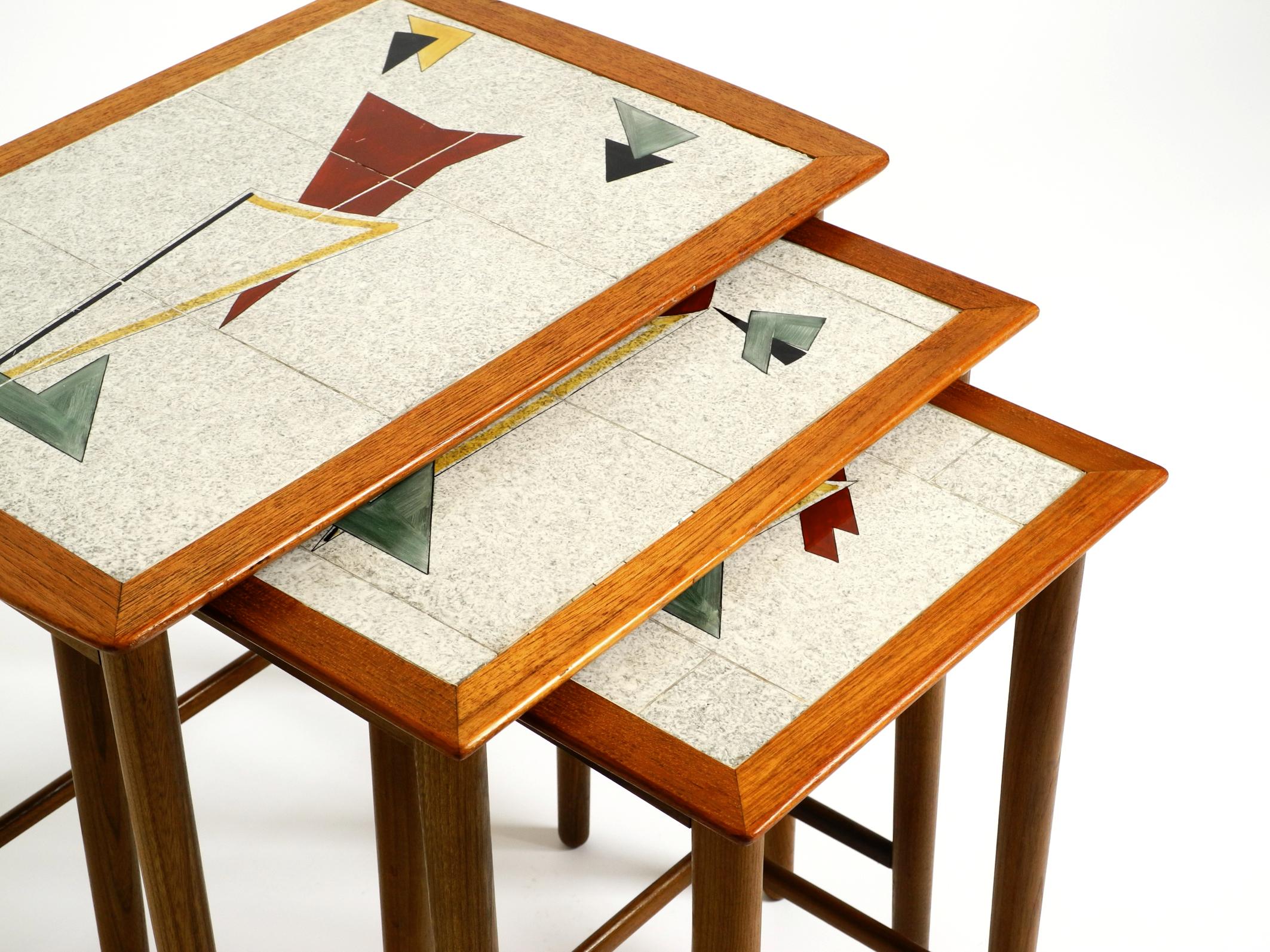 Original Mid Century set of 3 teak nesting tables with colorful Formica surfaces 1