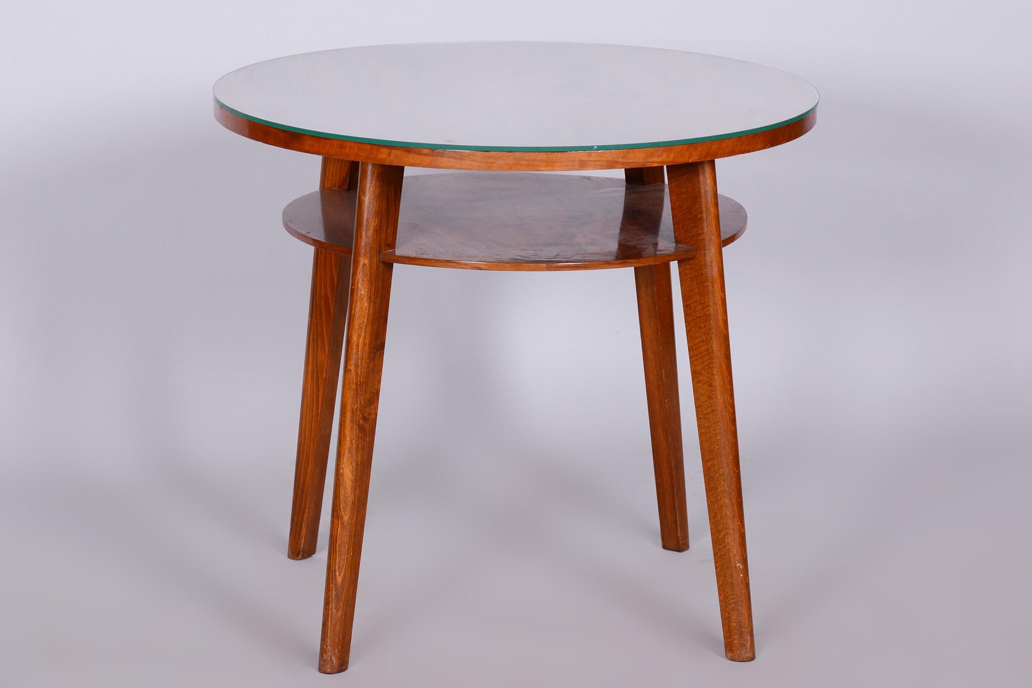 Original midcentury small round table.

Period: 1950-1959
Maker: JITONA Sobeslav
Source: Czechia
Material: beech, walnut, glass

Very well-preserved original condition.
Solid and stable construction.