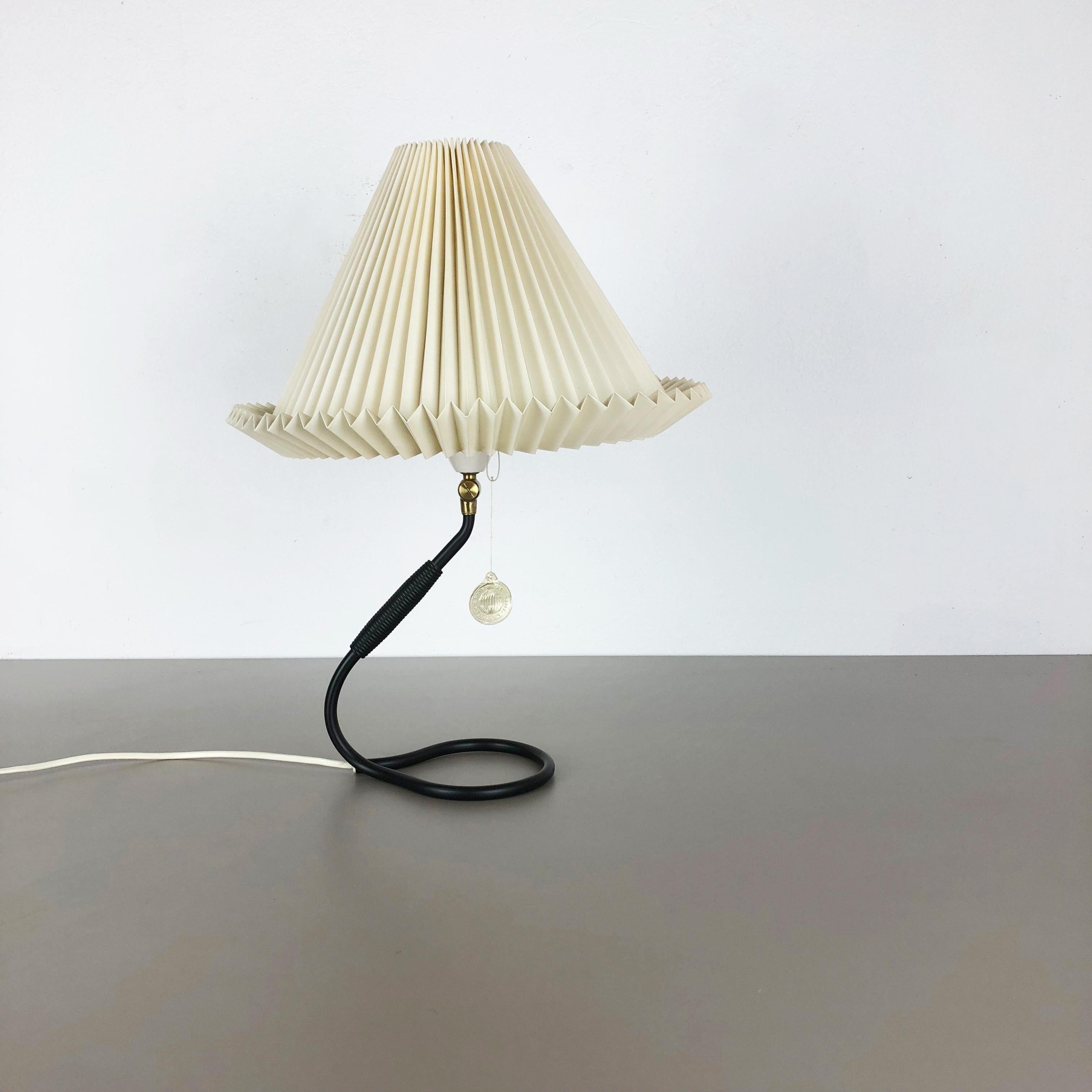 Article:

Table light


Producer:

Le Klint


Designer:

Kaare Klint


Age:

1960s




Description:

This super rare desk light was designed by Kaare Klint in the 1950s and produced by the company Le Klint in Denmark in the