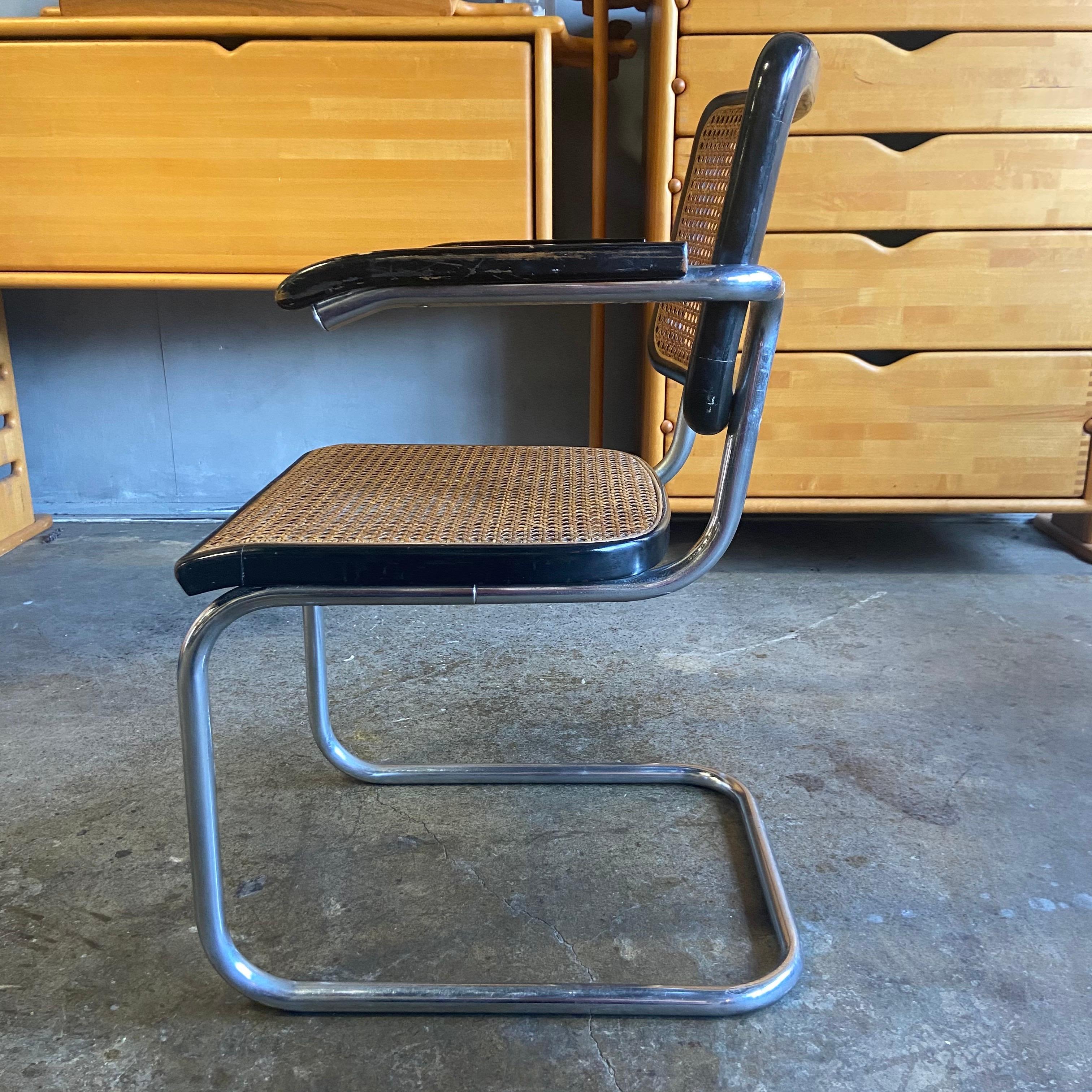 
For your consideration is this beautiful Cesca by Marcel Breuer for Thonet from the 1940's. Nearly a century old with incredible patina. Original black lacquer frame and canework on chrome frame. Retains the original label. 

This chair is simply