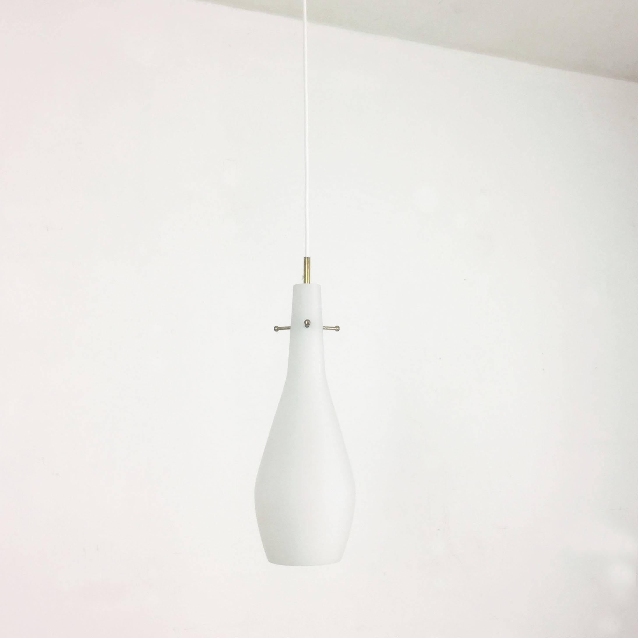 Article: Hanging light 


Origin: Italy


Age: 1960s 


 

This fantastic glass tube hanging light was designed and produced in 1960s in Italy. The shade is made of high quality opal glass, with a nice brass hanging compartment with three