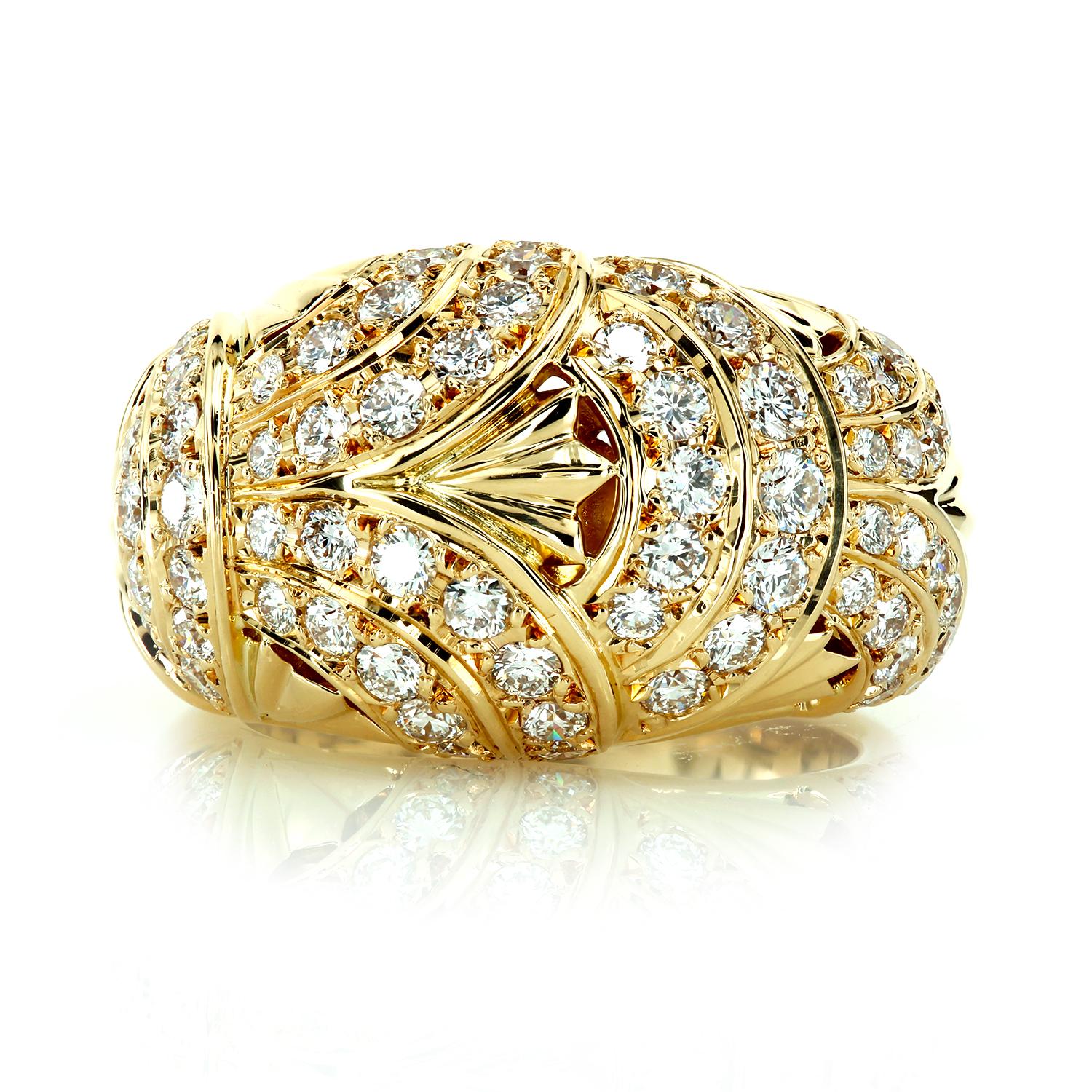 Puffy gold ring with flowery pave motif, pierced gallery inside, finger size 6 1/4 with 1.68 carats of exceptionally well-cut white diamonds.
We counted diamonds - 70 stones.
The band is tapered from 15.00 mm width to 6.00 mm width. Height is 8.0