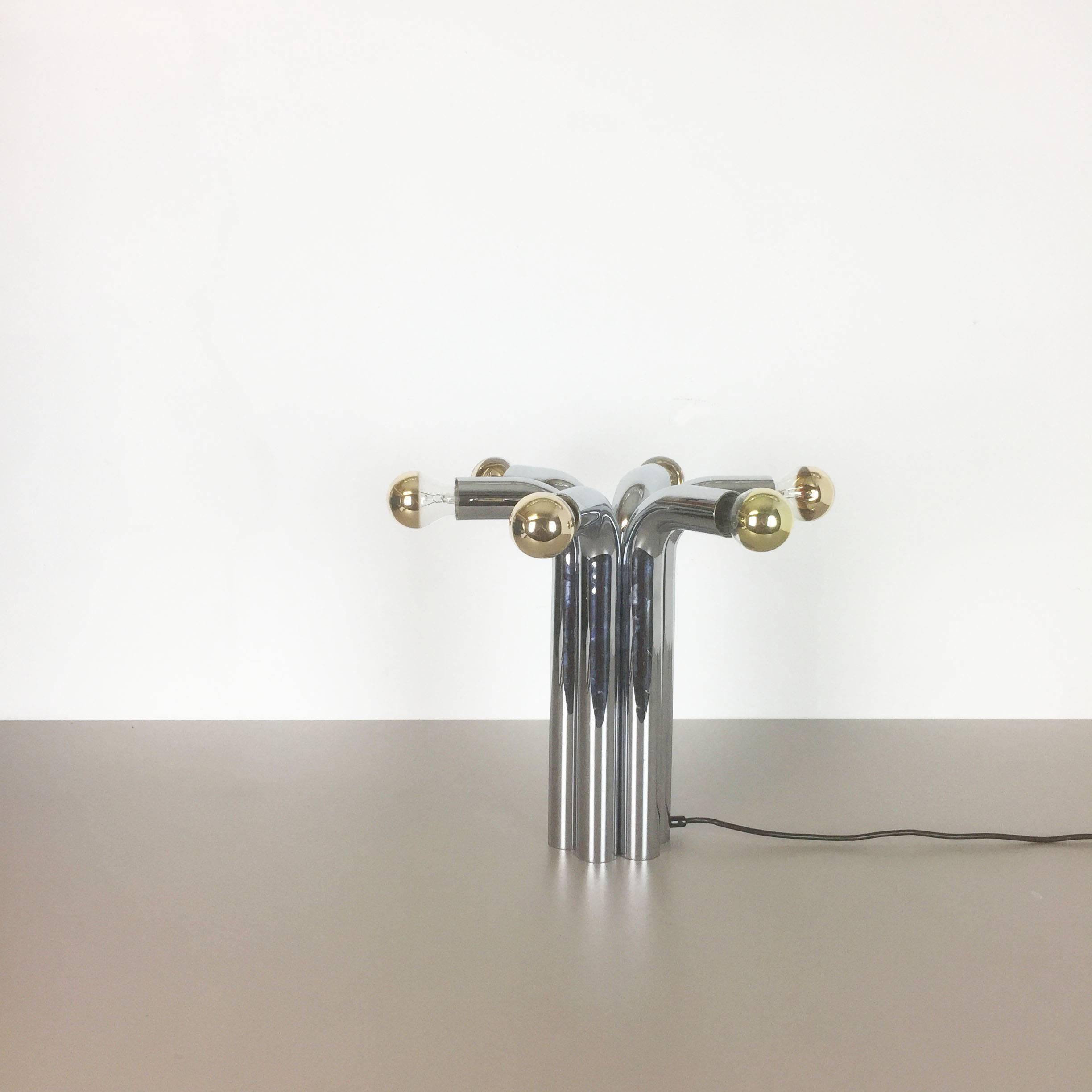 Article:

Sputnik table light


Producer:

Cosack Lights, Germany


Origin:

Germany



Age:

1960s




Description:


This 1960s hanging light was made by Cosack Lights in Germany. The light is made of solid metal in