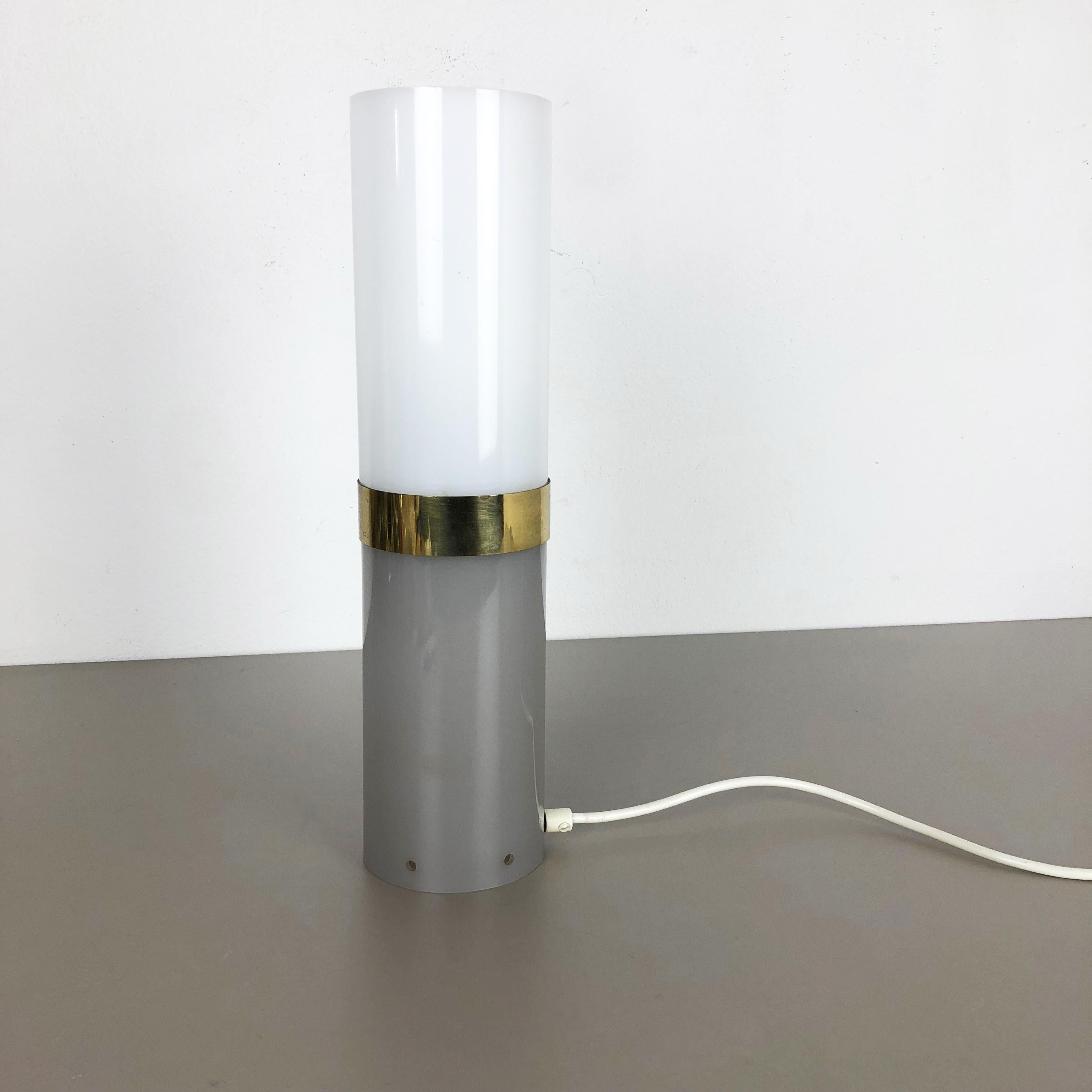 Article:

Table light


Origin:

Italy


Age:

1960s.



   

This fantastic and minimalist table light was designed and produced in the 1960s in Italy. It was made of acryl and features two different colored elements connected