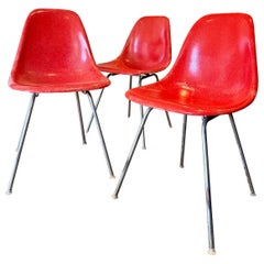Original molded fiberglass shell chairs, by Charles & Ray Eames for Heman miller