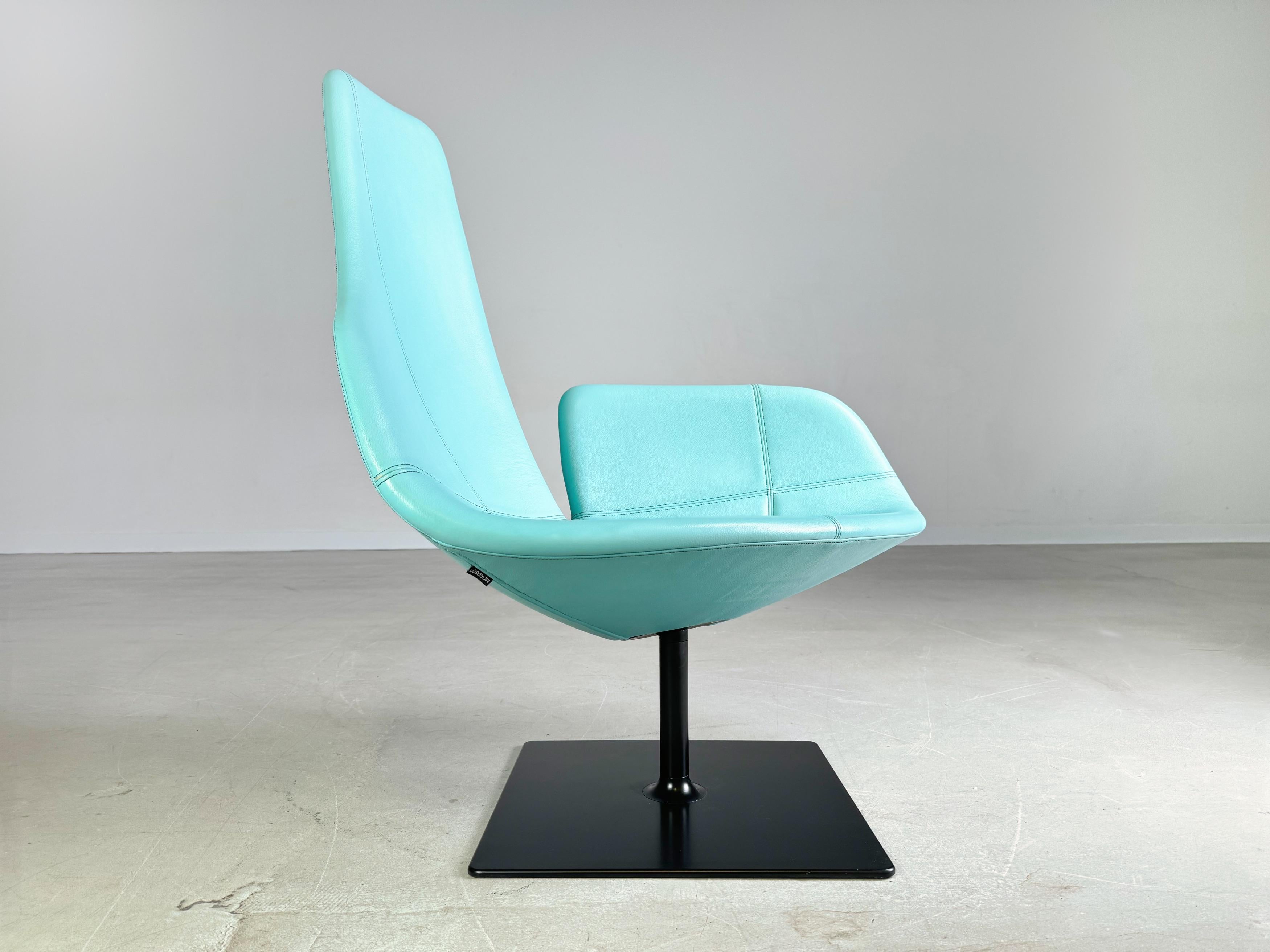 We are offering a beautiful light blue/ turquoise swivel chair/ armchair from Moroso for sale. The design is by Patricia Urquiola and is characterized by its unique shape and high seating comfort. The swivel seat shell gives the armchair a wide