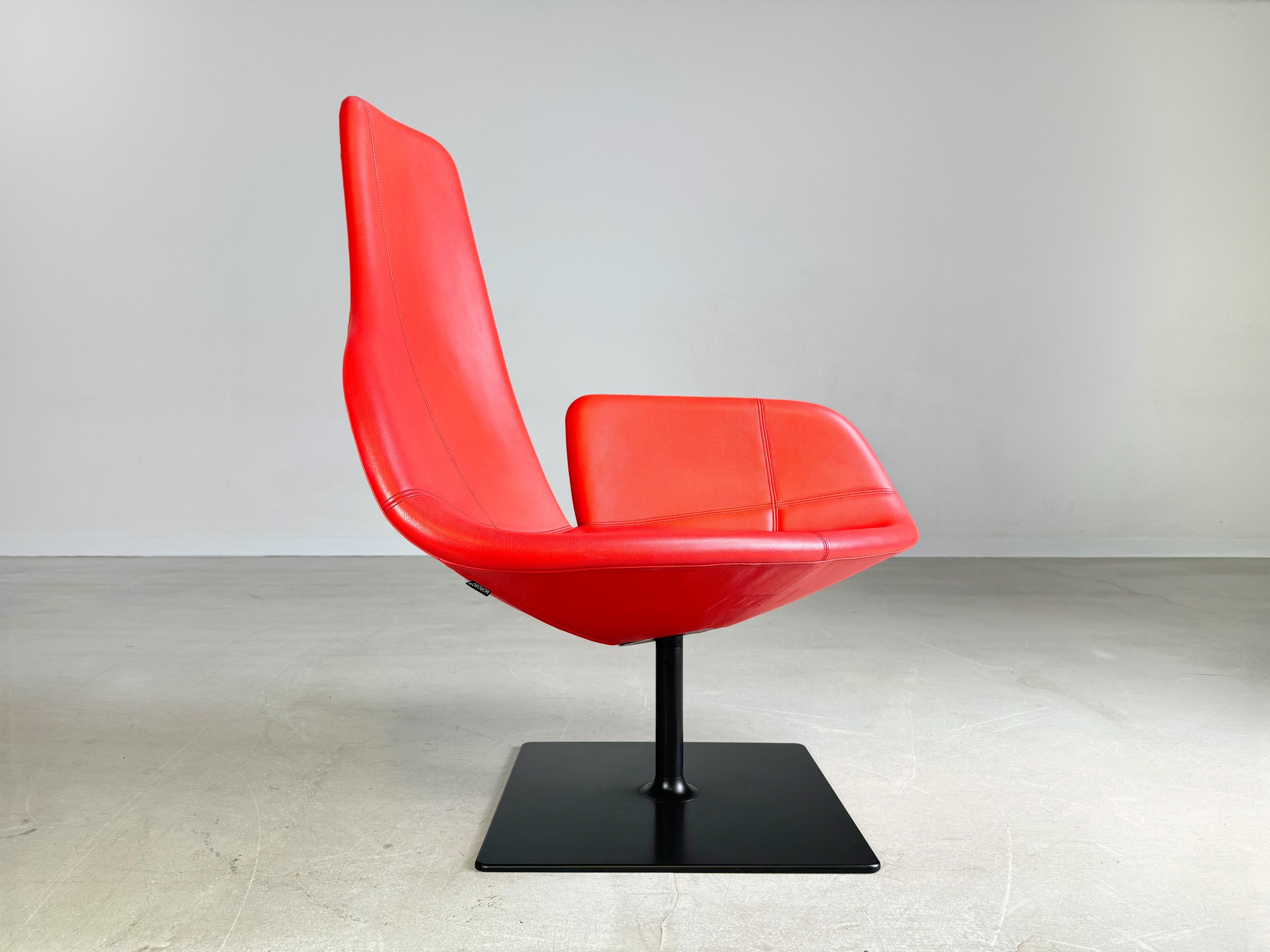 We are offering a beautiful red swivel chair/armchair from Moroso for sale. The design is by Patricia Urquiola and is characterized by its unique shape and high seating comfort. The swivel seat shell gives the armchair a wide range of possible uses,