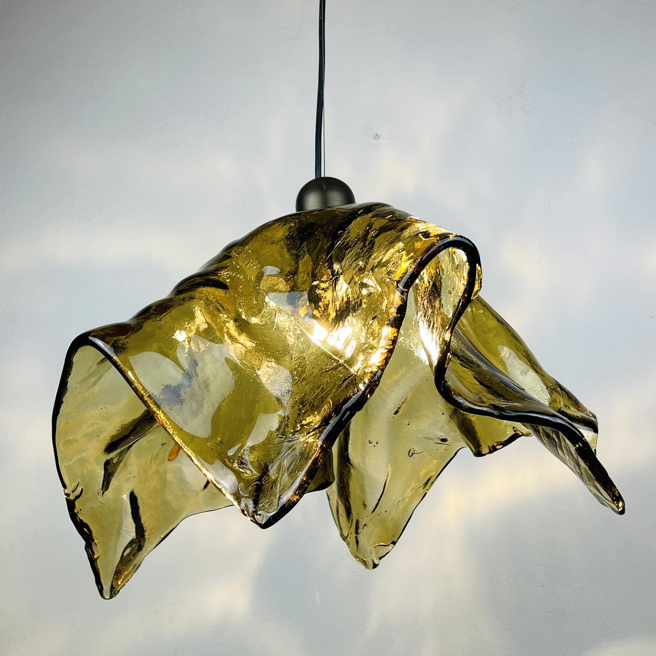 Original impressive Murano pendant lamp, produced by AV Mazzega in Italy, in the 1950s. The shade of this model, also known as 'Fazzoletto', resembles a large handkerchief. The shade is molded by hand. The lamp also displays some true Murano