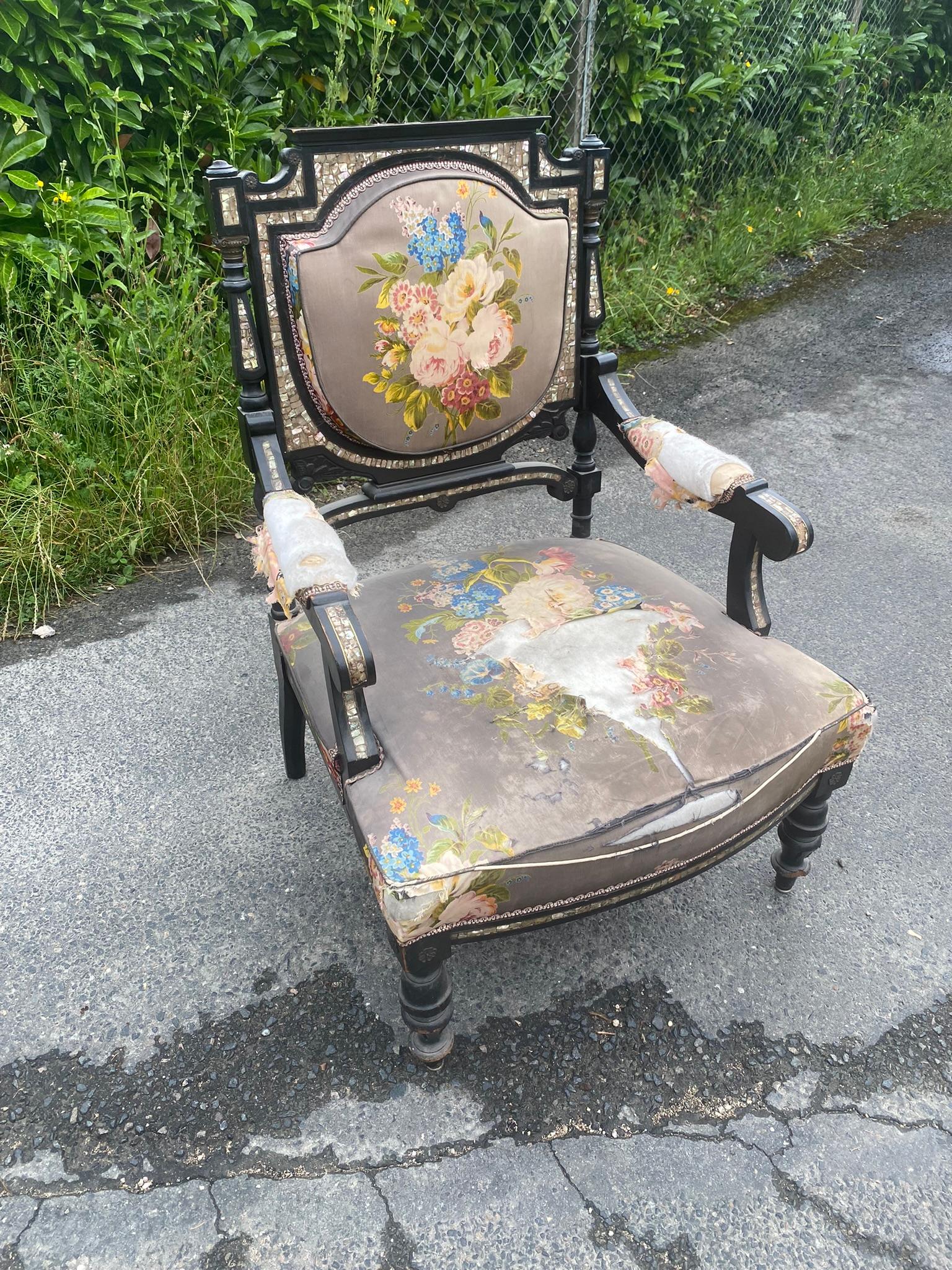 Original Napoleon III armchair, blackened wood, mother-of-pearl inlay. 
Small lack of mother-of-pearl on an armrest.