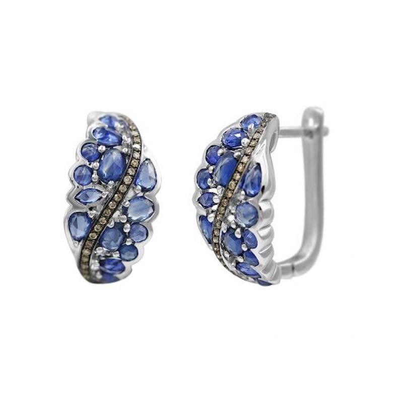Ring White Gold 14 K (Matching Earrings Available)
Diamond 76-RND 57-0,47-4/6
Blue Sapphire
Weight 3.23 grams
US Size 7


With a heritage of ancient fine Swiss jewelry traditions, NATKINA is a Geneva based jewellery brand, which creates modern