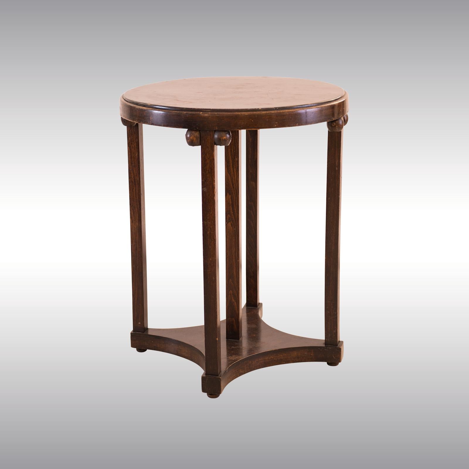 A petite coffee table by Josef Hoffmann from 1905 made by J&J Kohn in beechwood.