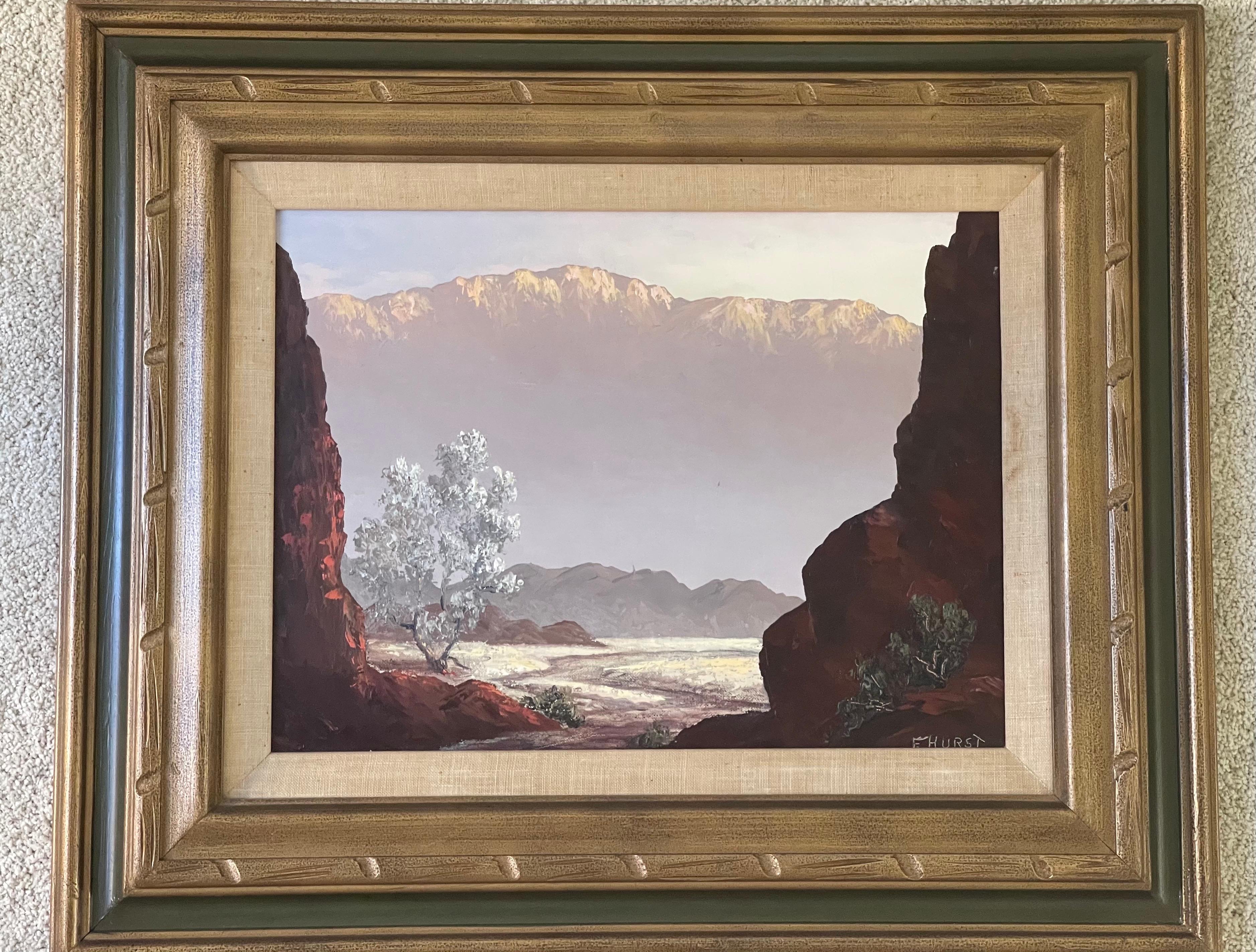 Absolutely stunning original oil on board landscape by listed artist Martha Eleanor Nicholson Hurst, circa 1950s. Hurst studied under Andrew Wyeth and Olaf Wieghorst and later, John Hilton. The painting depicts a view of snow covered mountains from