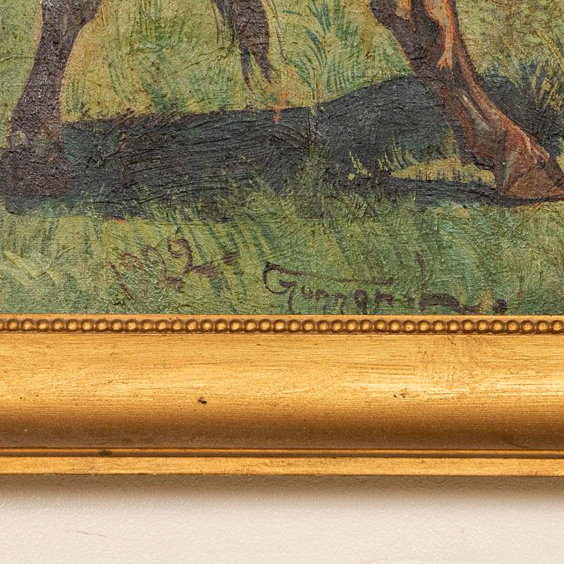 Original oil on canvas painting of a lone bull in a field, signed and dated in the lower left Gunnar L. 1922. While there are some 