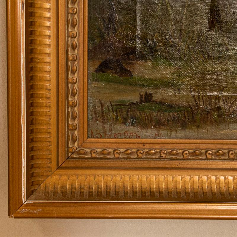 There is an appeal to this delightful painting of cows in a pond, signed by A.B.Morgan. The canvas has craquelure throughout, pin holes, scrapes and peelings present as well. The frame shows expected age related wear with gold paint scraped and
