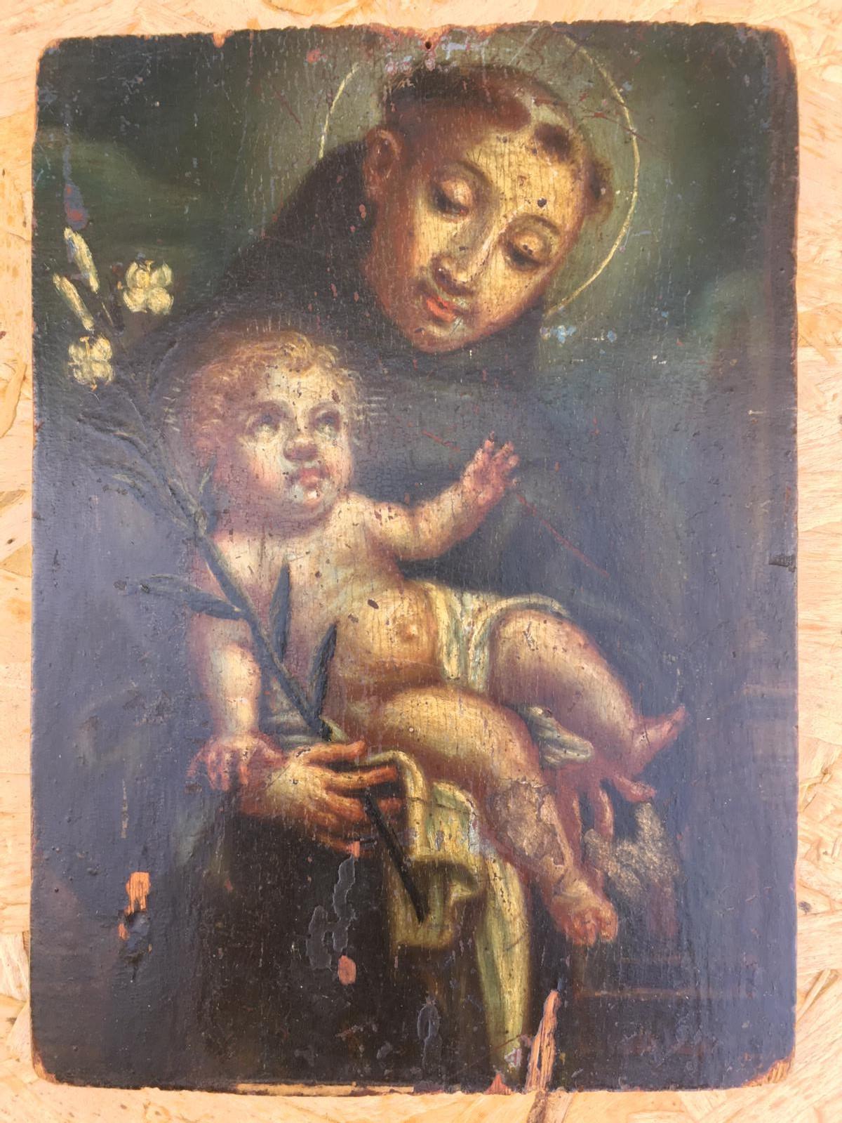 Original oil on panel of Saint offering the Child, by an unidentified artist.

--This painting represents St. Anthony of Padua. The scene is one that is often chosen to represent him: his fellow Franciscans looked out the window one day and saw a