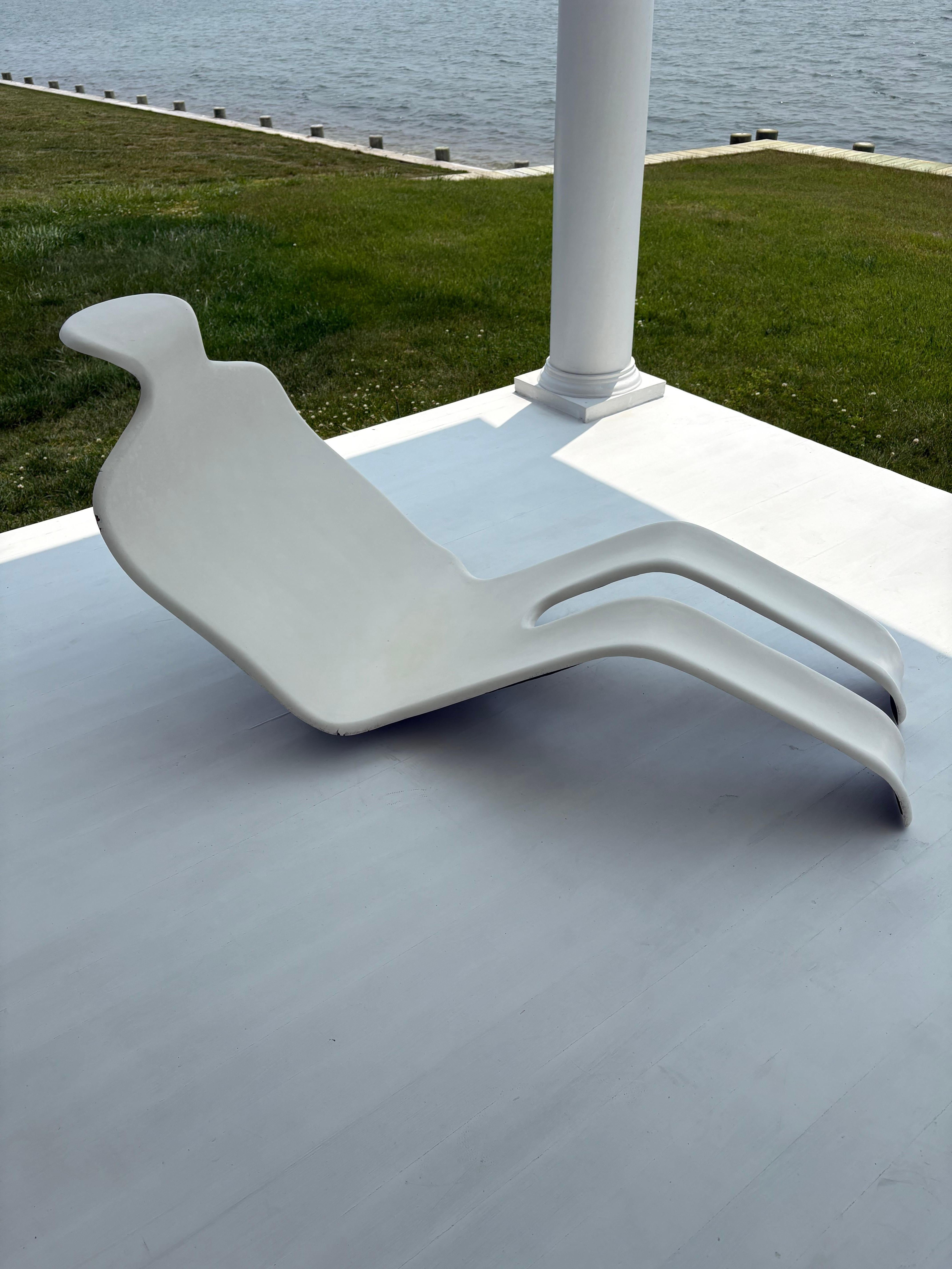 Iconic “Bouloum” chase lounge designed by Olivier Mourgue., a French industrial designer . This fiberglass sculptural lounge has a  human body shape and said to be named after a childhood friend . Cool art piece. Playful , fun and comfortable .Great