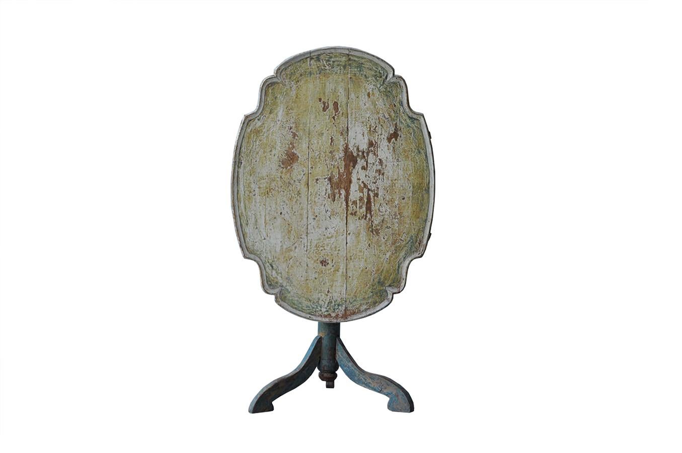 This original paint 18th century tilt-top table has been dry scraped to original paint and features a superb time worn patina.
